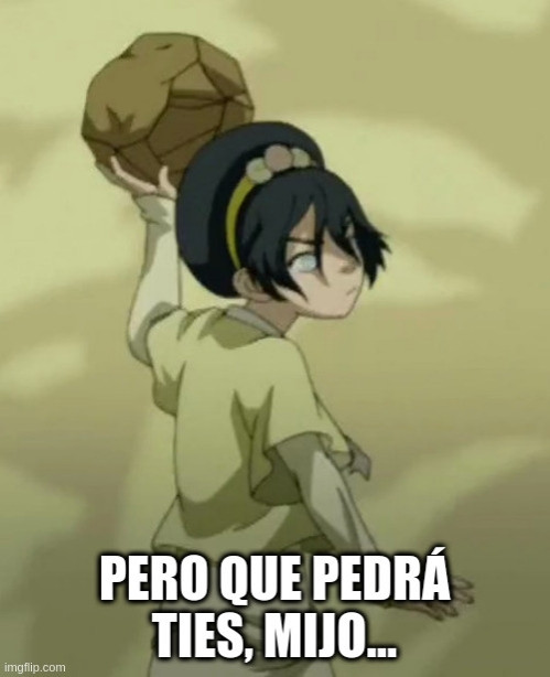 Toph (La leyenda de Aang) con una piedra en la mano para lanzarla.
DT: menuda pedra'