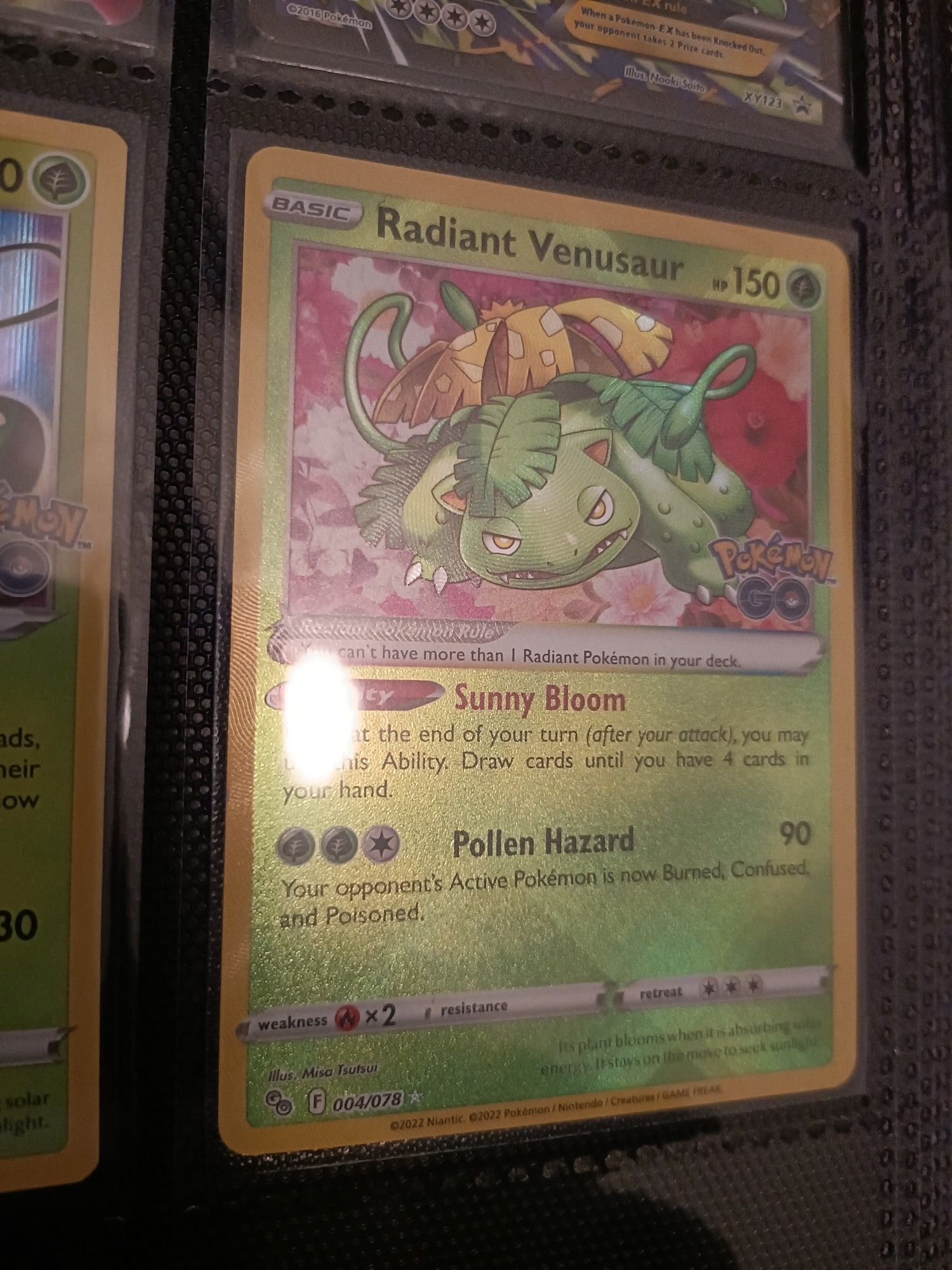 A Pokemon Card featuring a shiny Venusaur