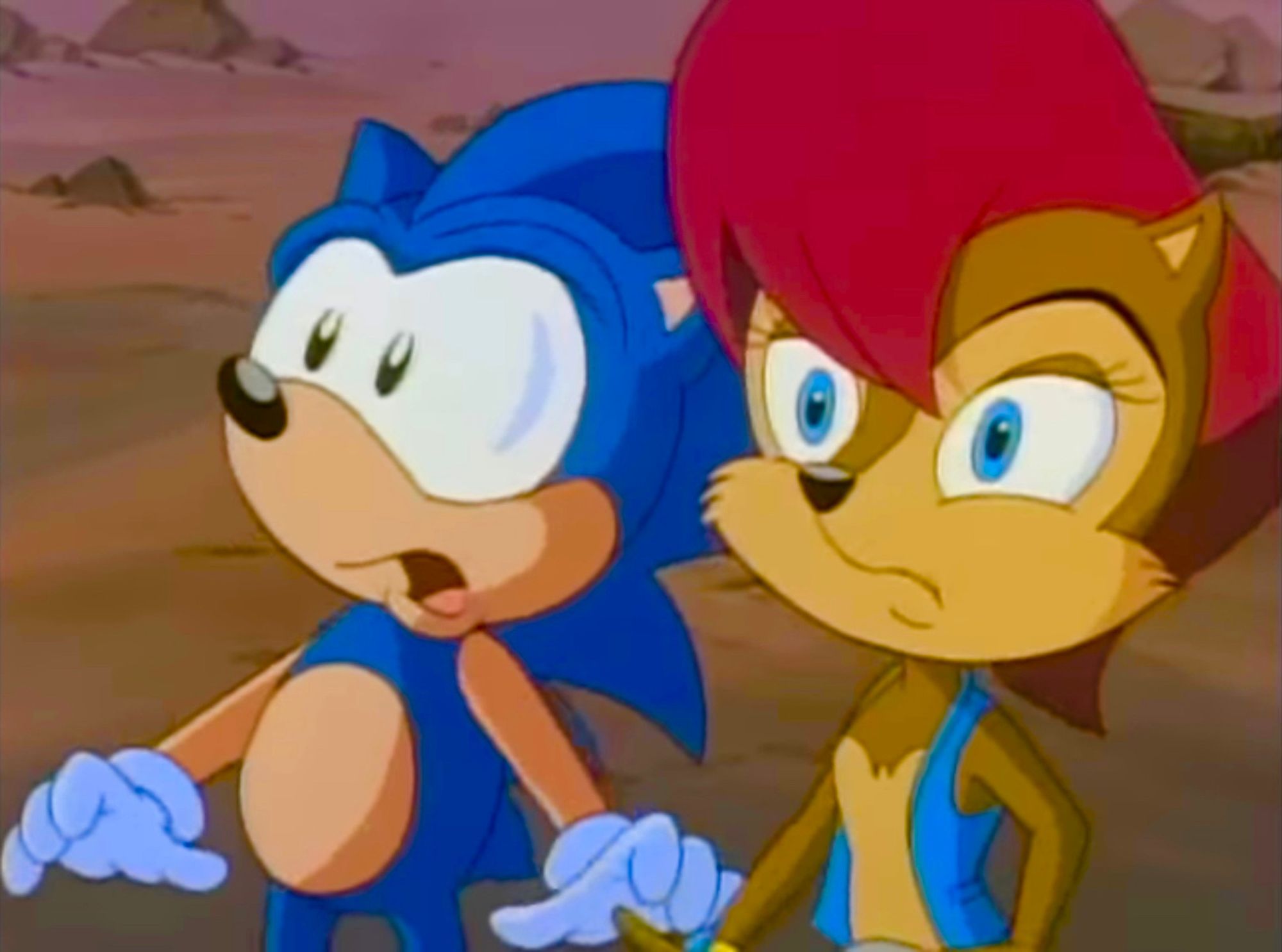 A screenshot of Sonic and Sally from the 90s Sonic the Hedgehog cartoon.