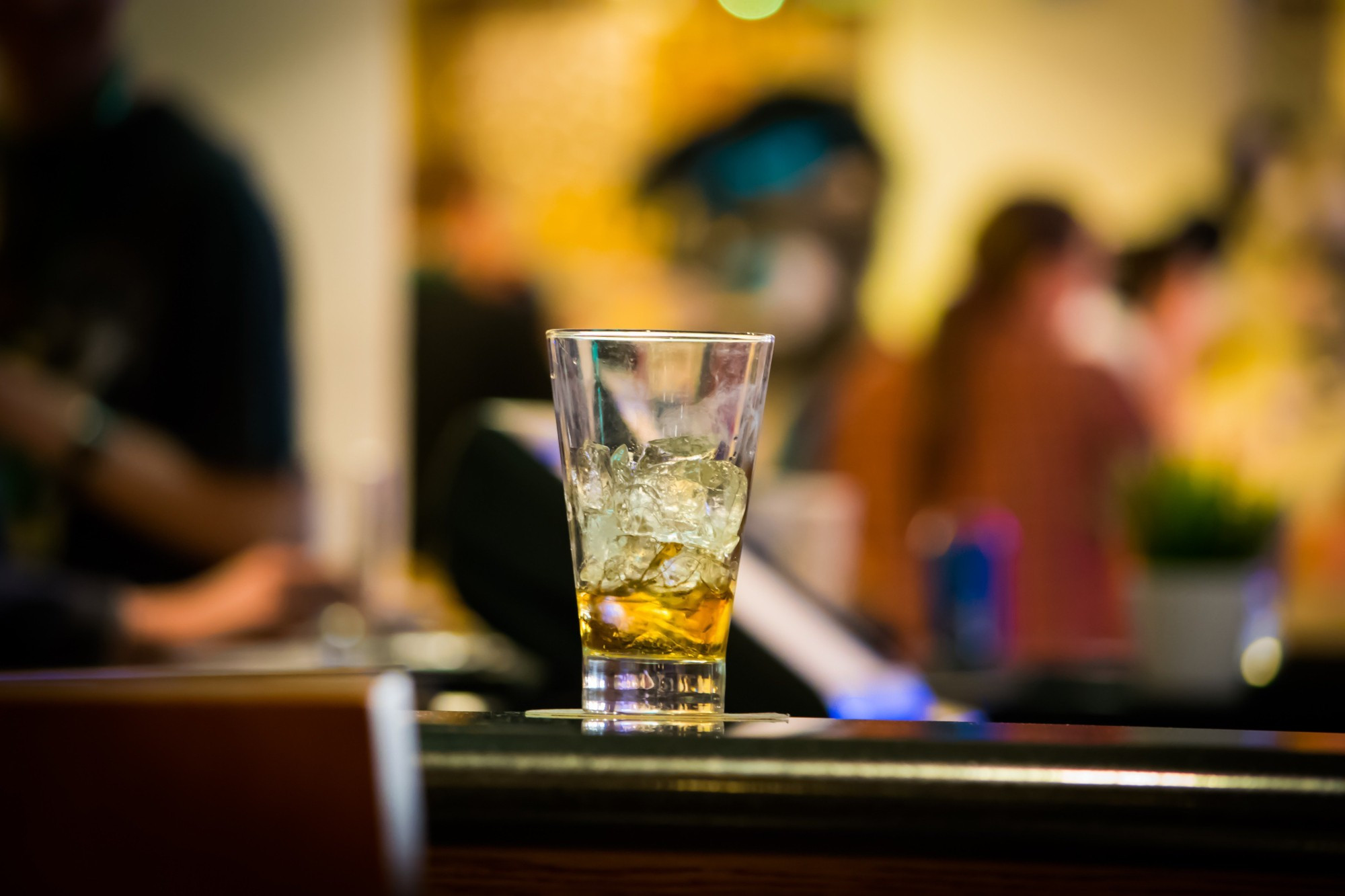 Photo of a liquor glass at a bar