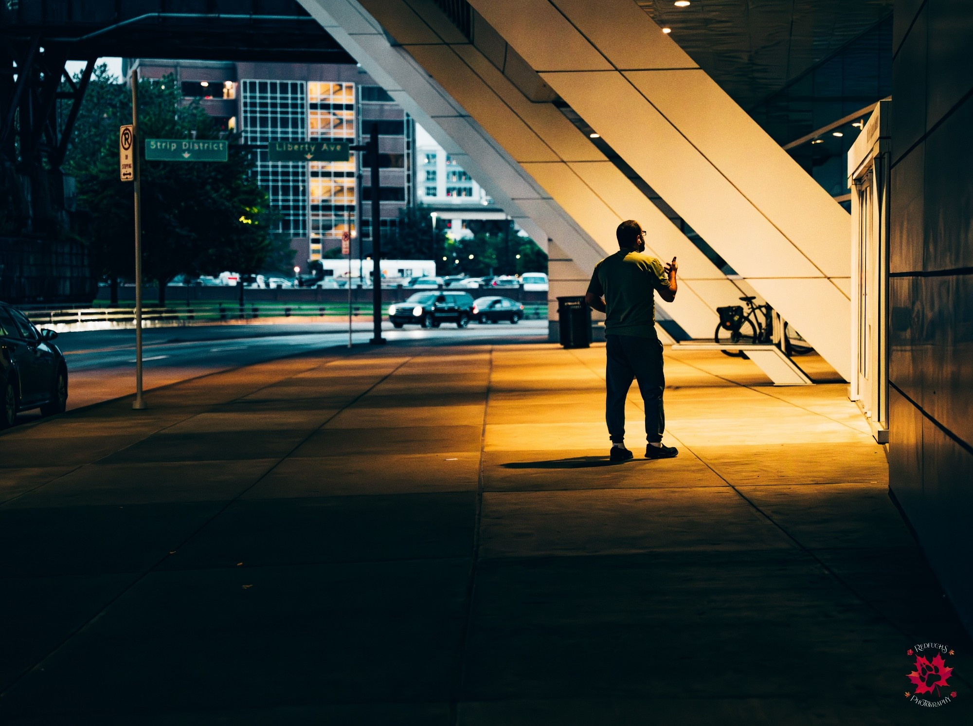 Photo of a delivery driver standing outside of Anthrocon's convention center