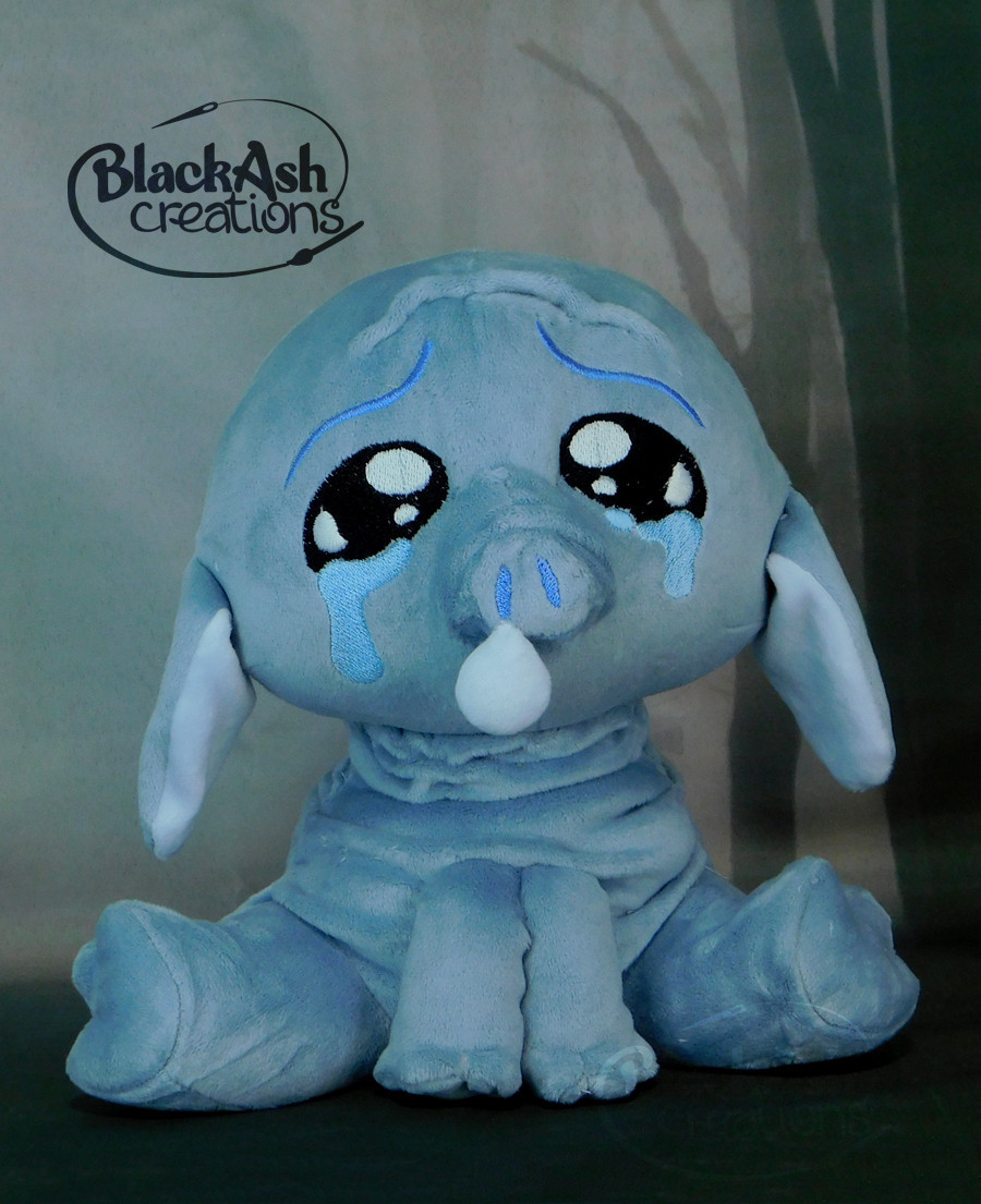 #plushart of a sad looking creature with wrinkly skin, big sad eyes full of tears and a snot bubble forming at its nose