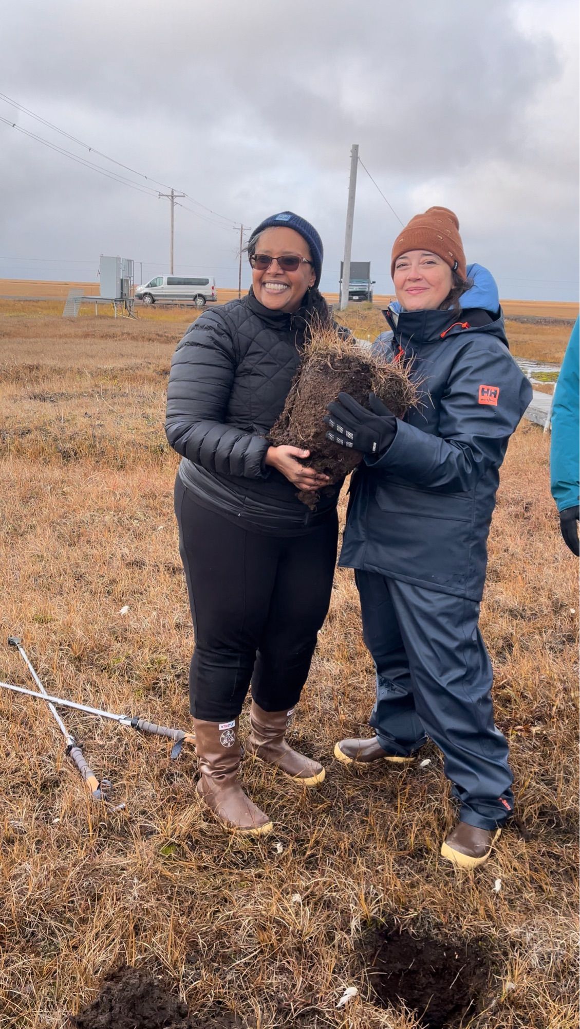 AAB and Collen holding (more like hugging) peat. (Utqiagvik, AK)