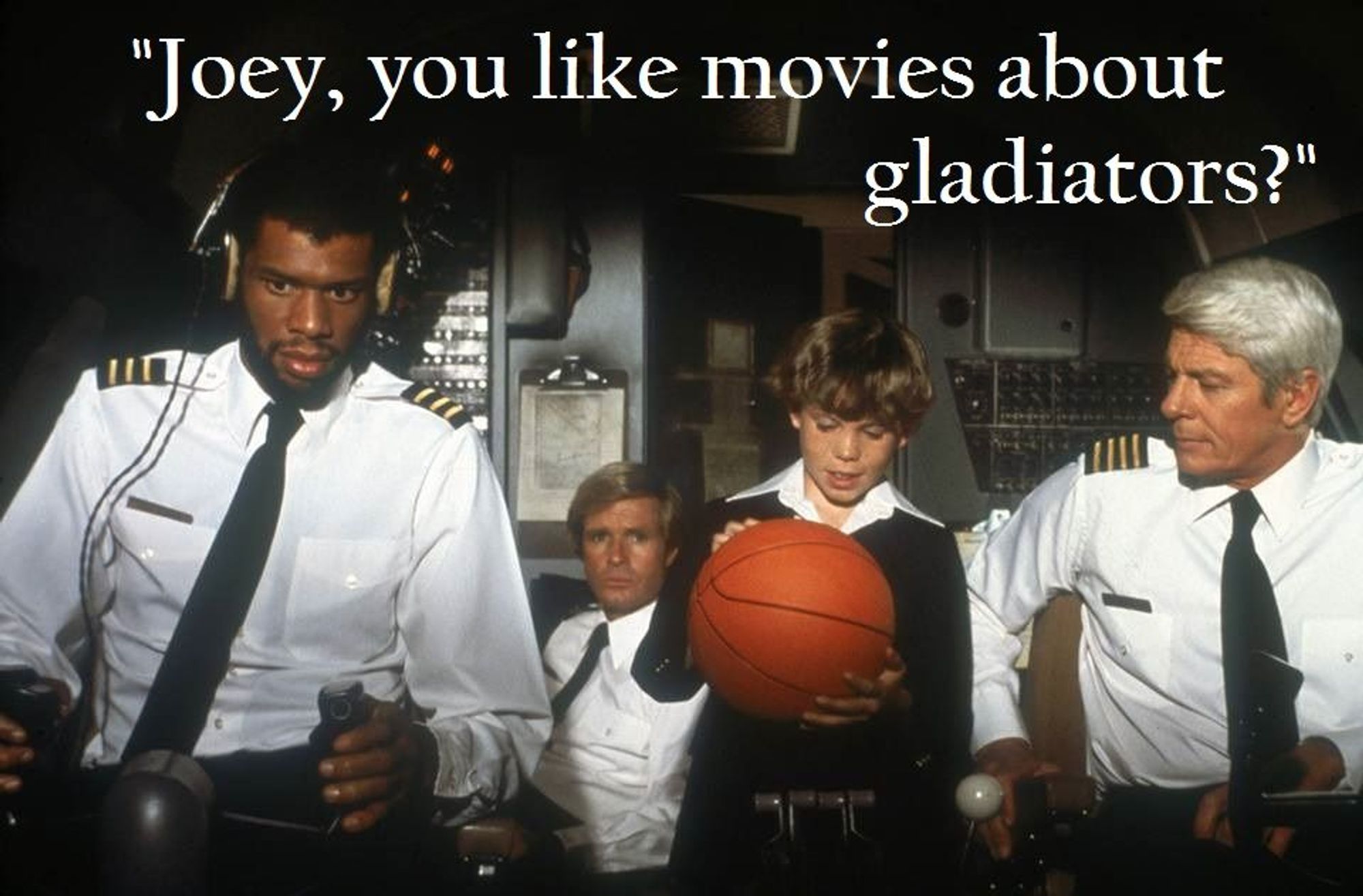 Still from 1980 movie "Airplane". The scene is the cockpit of a an airplane with the pilot (Peter Graves) asking a young boy "Joey, do you like movies about gladiators?"