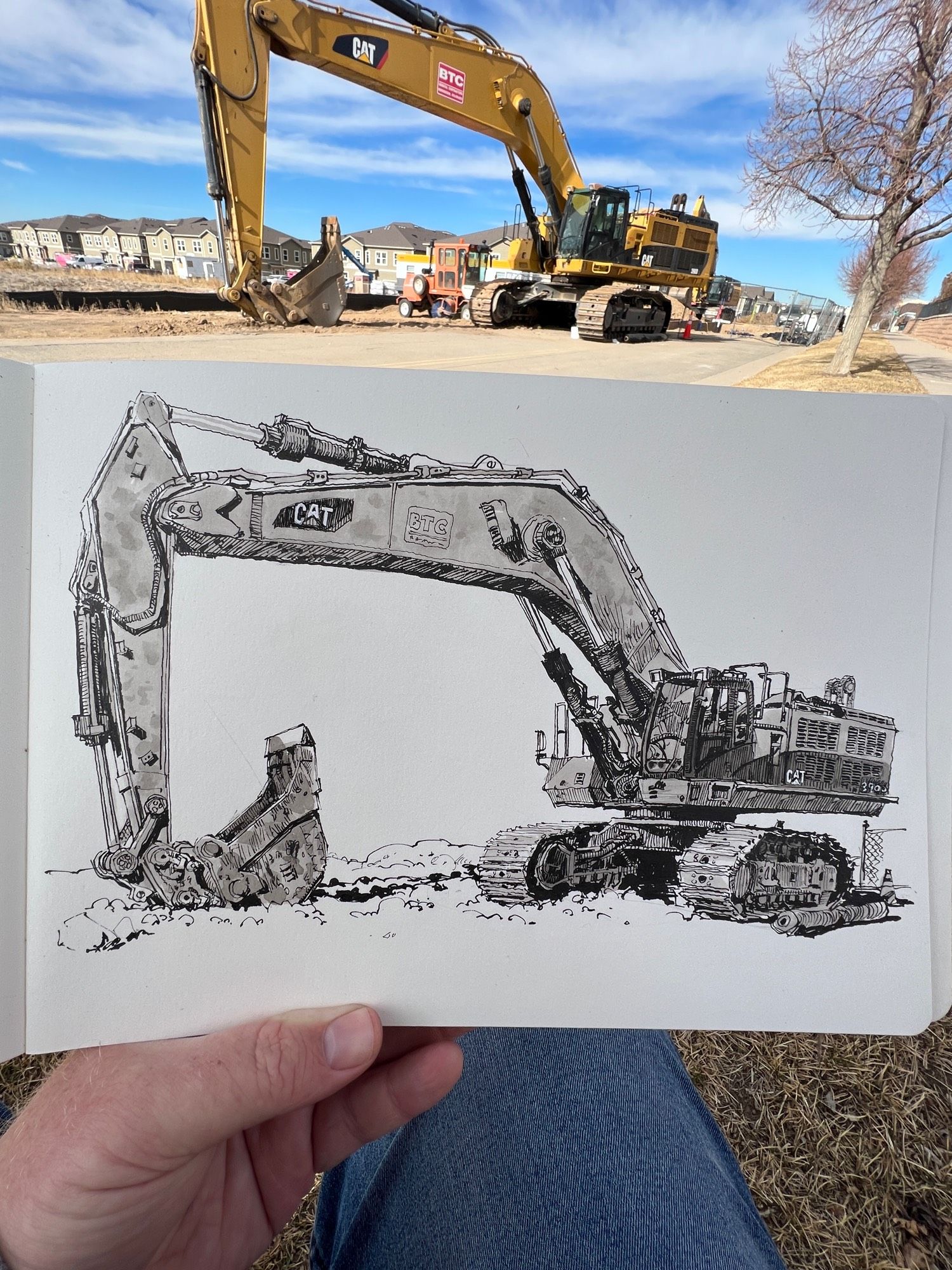 black and white pen and ink wash drawing of a Caterpillar excavator parked in a dirt lot