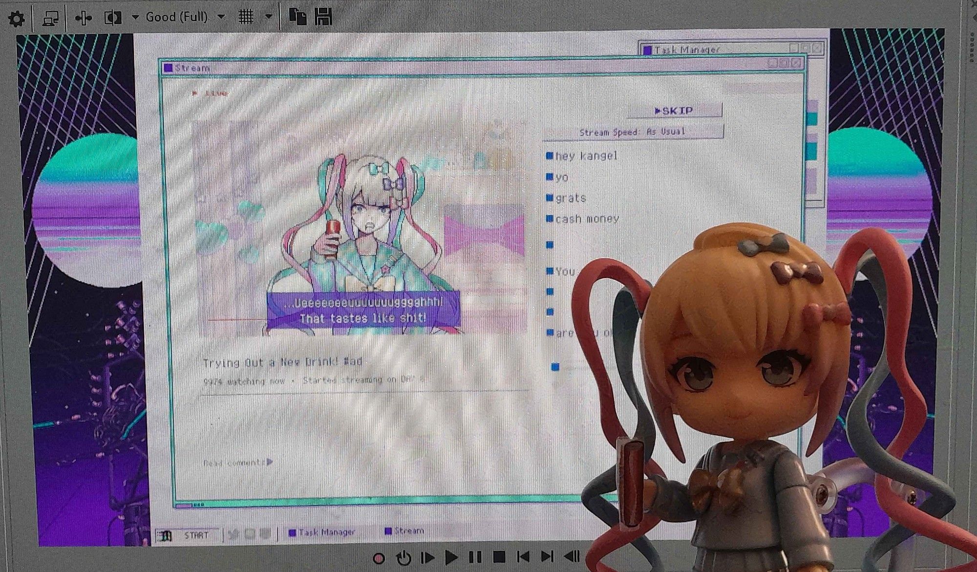 a photo of the OMGKawaiiAngel (Kangel) nendoroid posed in front of a computer with the Vegas 13 video editing software. In the software is footage of the game Needy Streamer Overload where Kangel does her first sponsorship stream involving a can of vile natto-flavored cola.