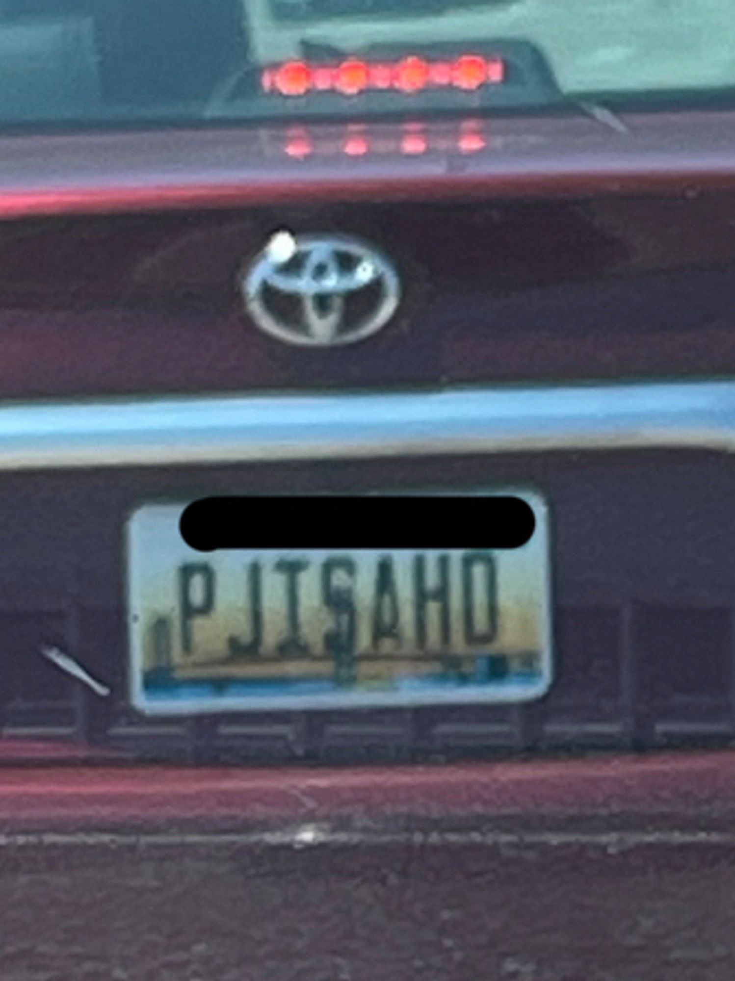 License plate that appears to say PJ is a Ho