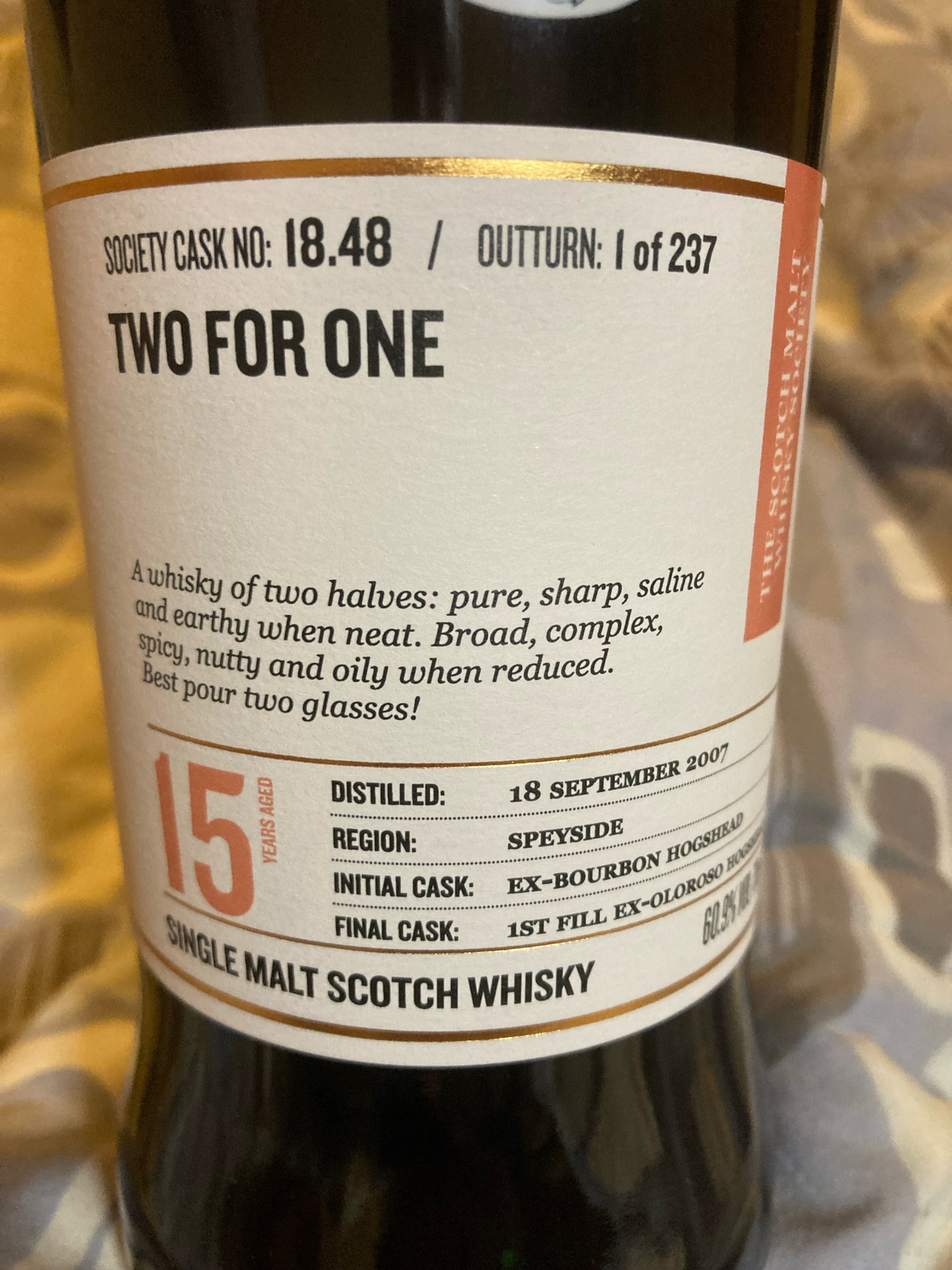 A bottle of 15 year old single malt scotch whisky called Two For One. 