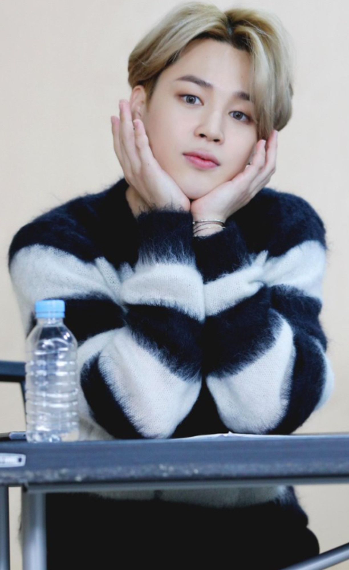 Blonde Jimin in black and white striped sweater