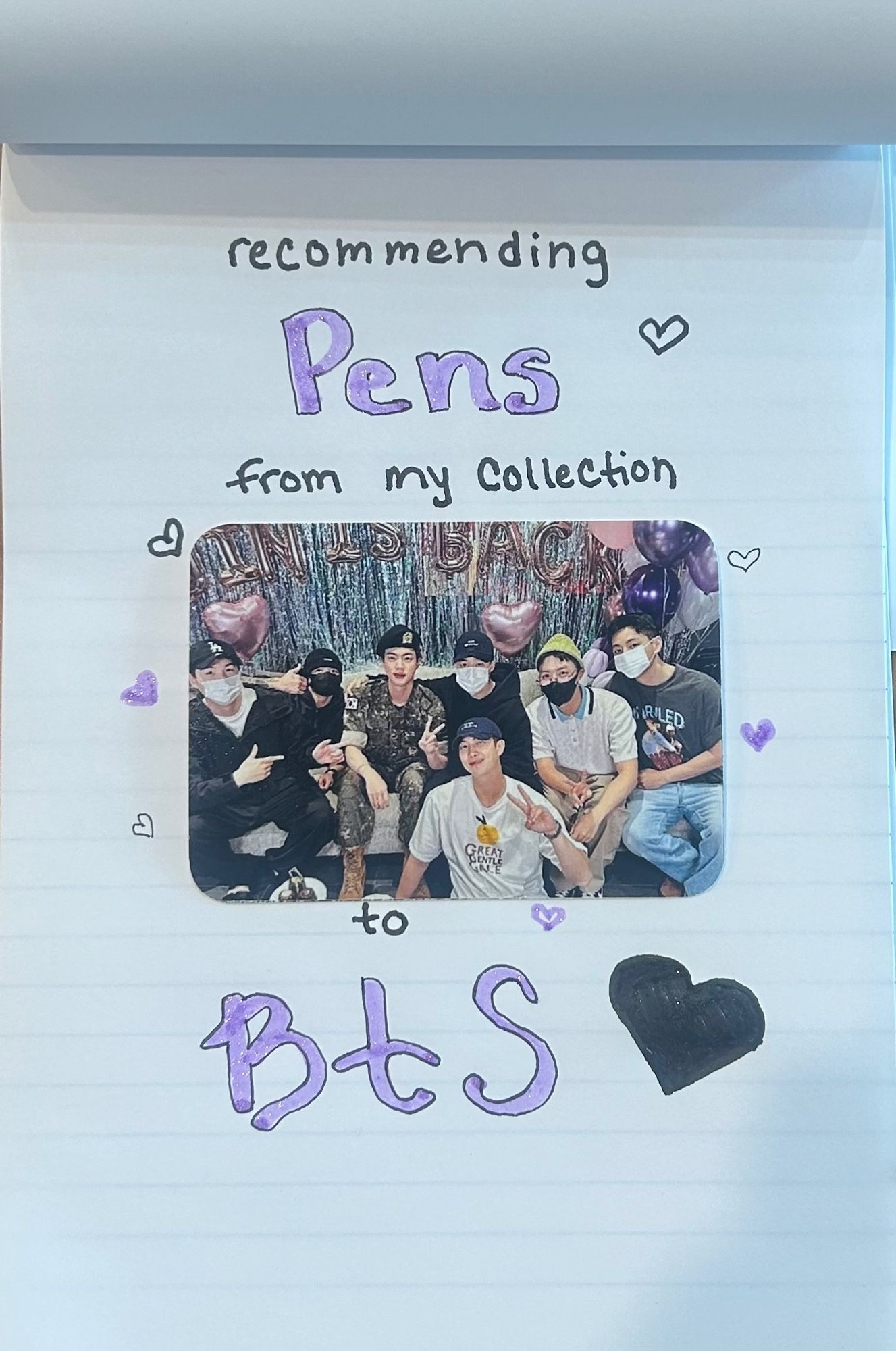 Piece of paper Recommending pens for my collection to BTS with purple and black hearts, and a photo card of their group shot from Jin discharge