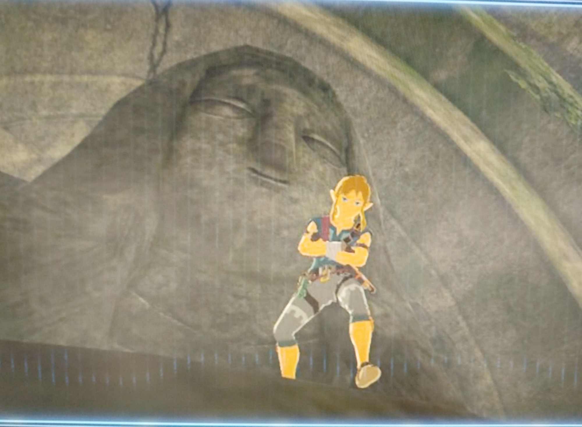 Link de chill con una estatua de la diosa Hylia. Es una foto hecha a una pantalla y se ve fatal.