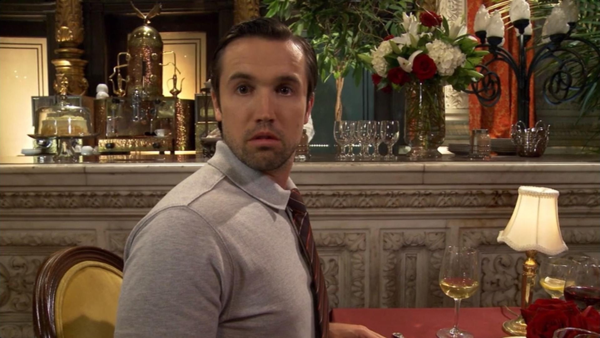 mac from always sunny staring at charlie across the restaurant 