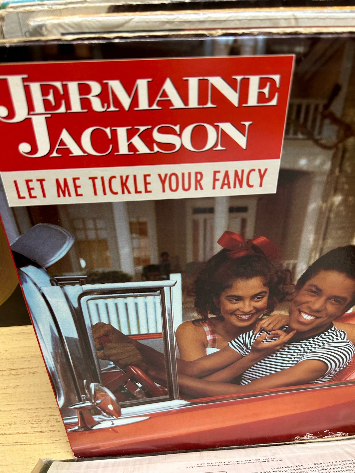 A Jermaine Jackson vinyl album titled “Let Me Tickle Your Fancy”