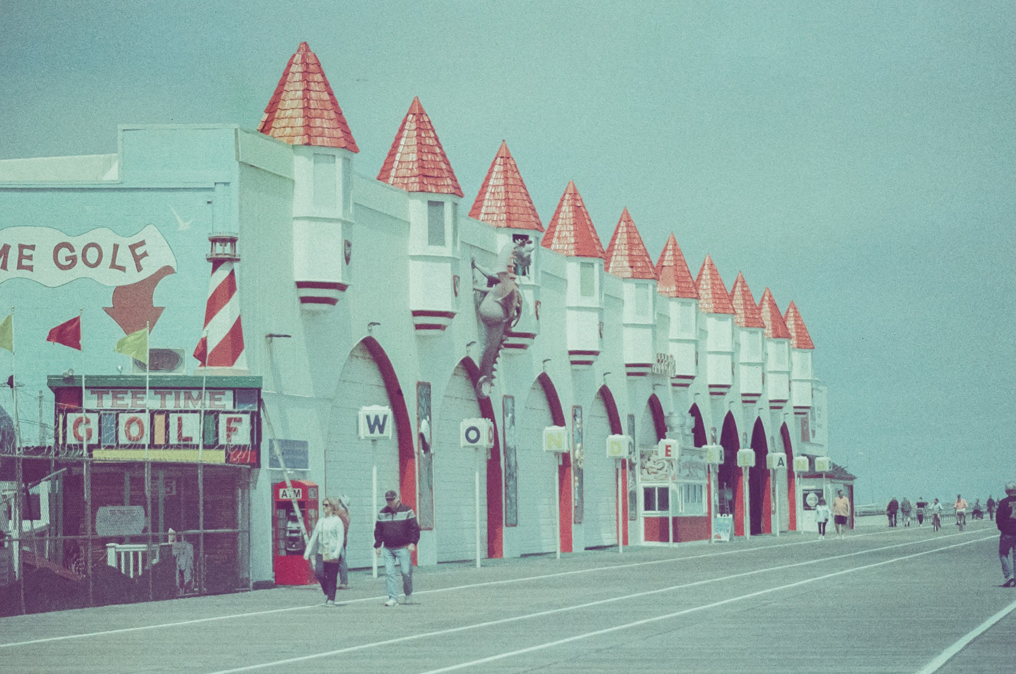 Gillian's Wonderland Pier, a white building with red accents, on the Ocean City boardwalk.