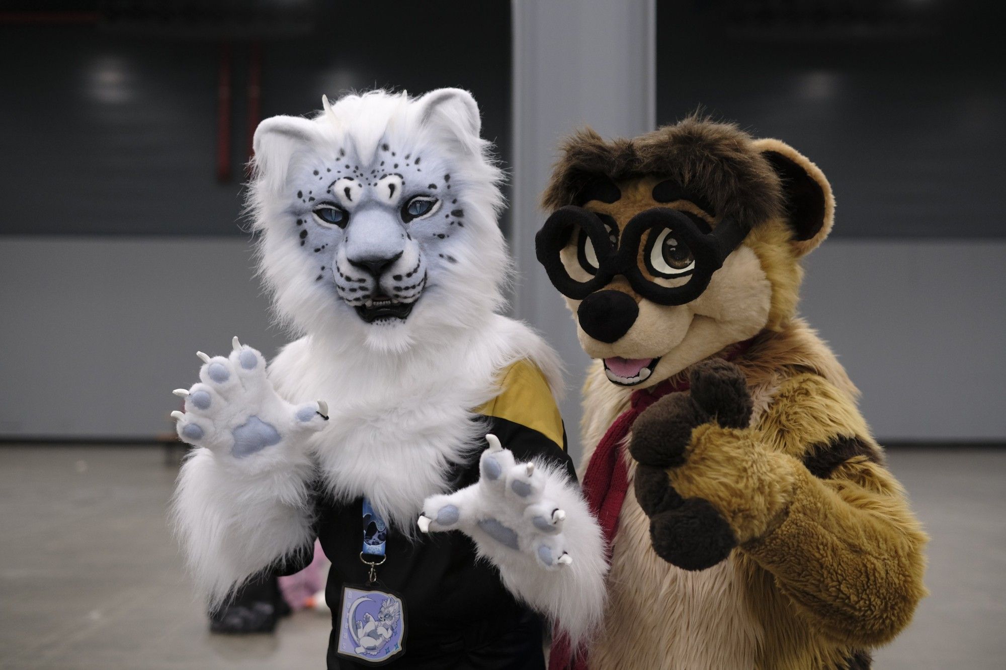 2 fursuiters at a convention