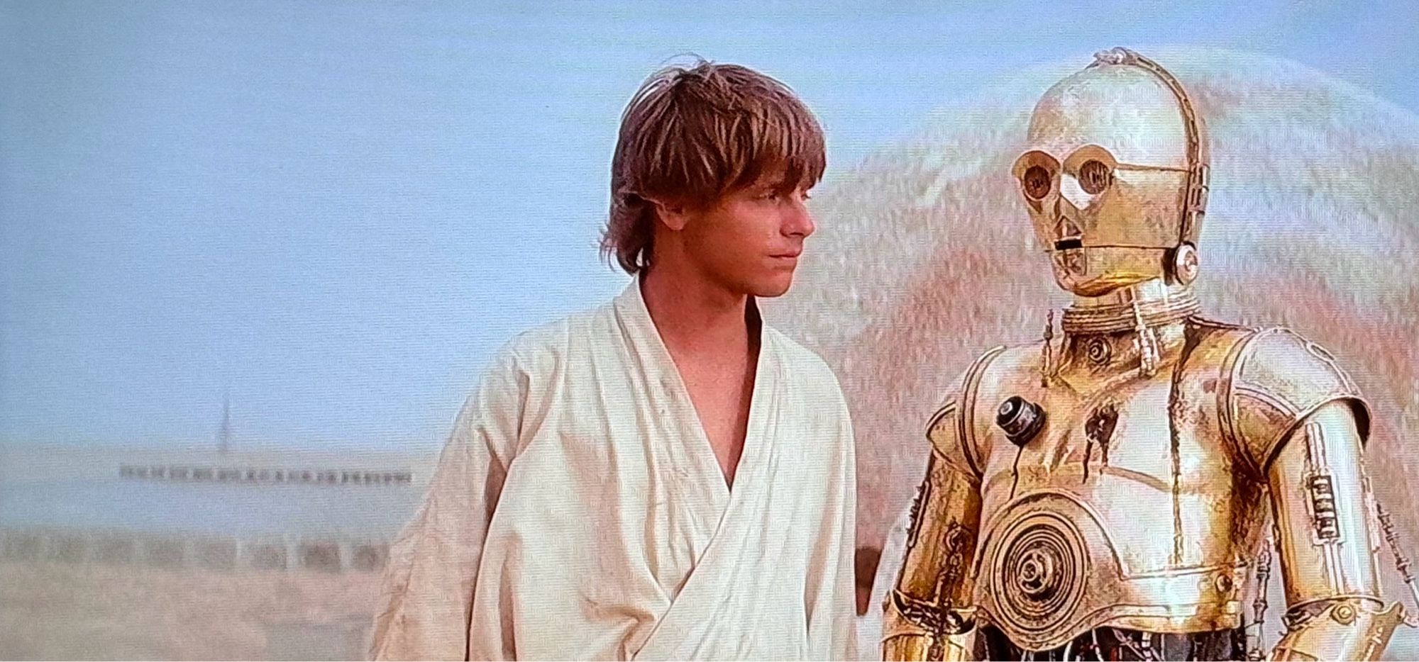 Luke Skywalker and C-3PO in a scene from Star Wars long before everything went off the rails