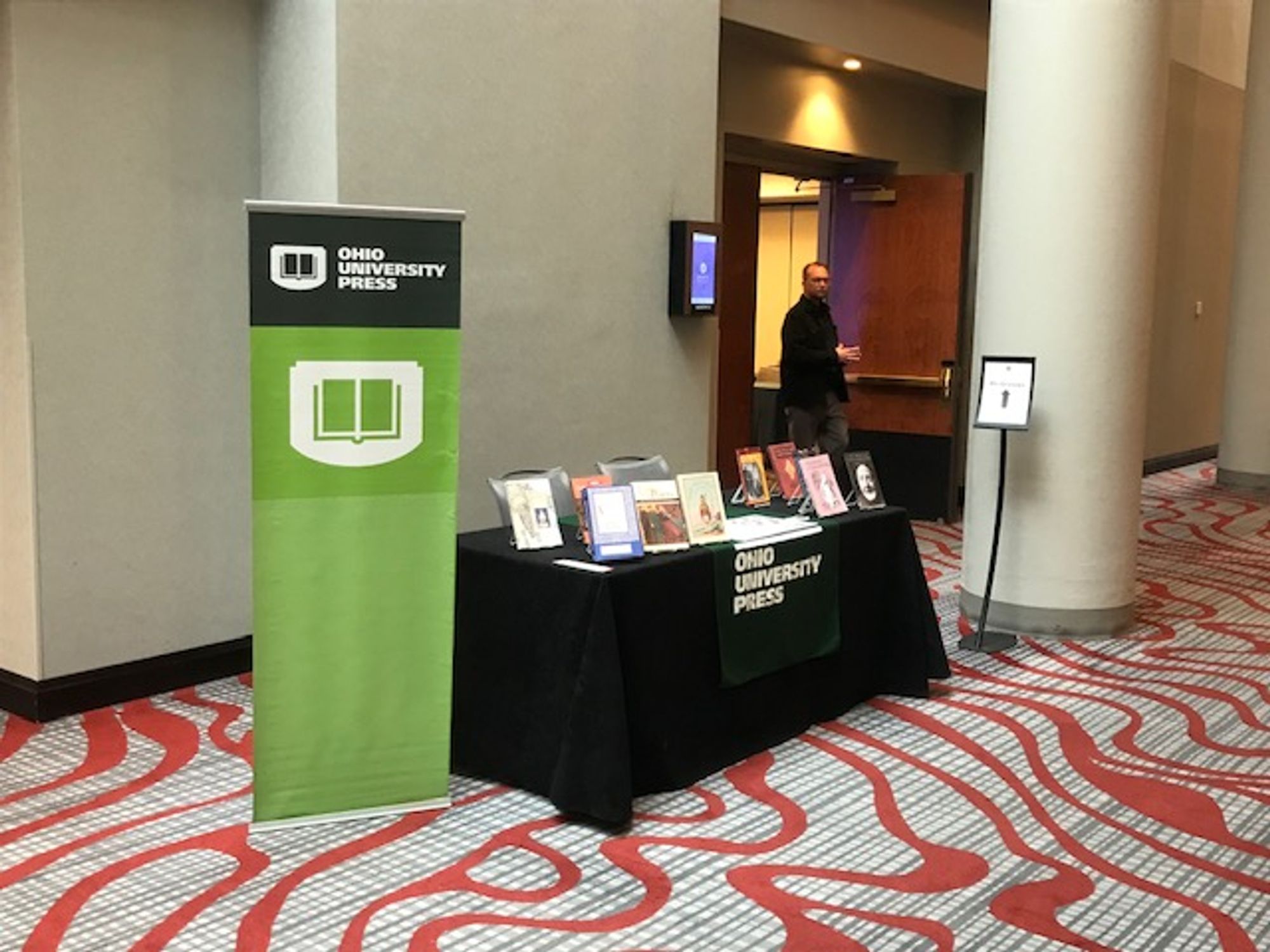 book display table with ten books and Ohio University Press signs