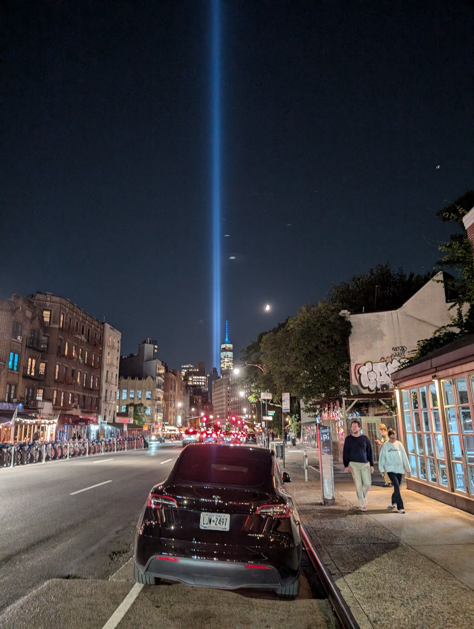 The "Tribute in Light" seen rising above the Freedom Tower, as seen down Seventh Avenue in NYC, 9/11/2024.