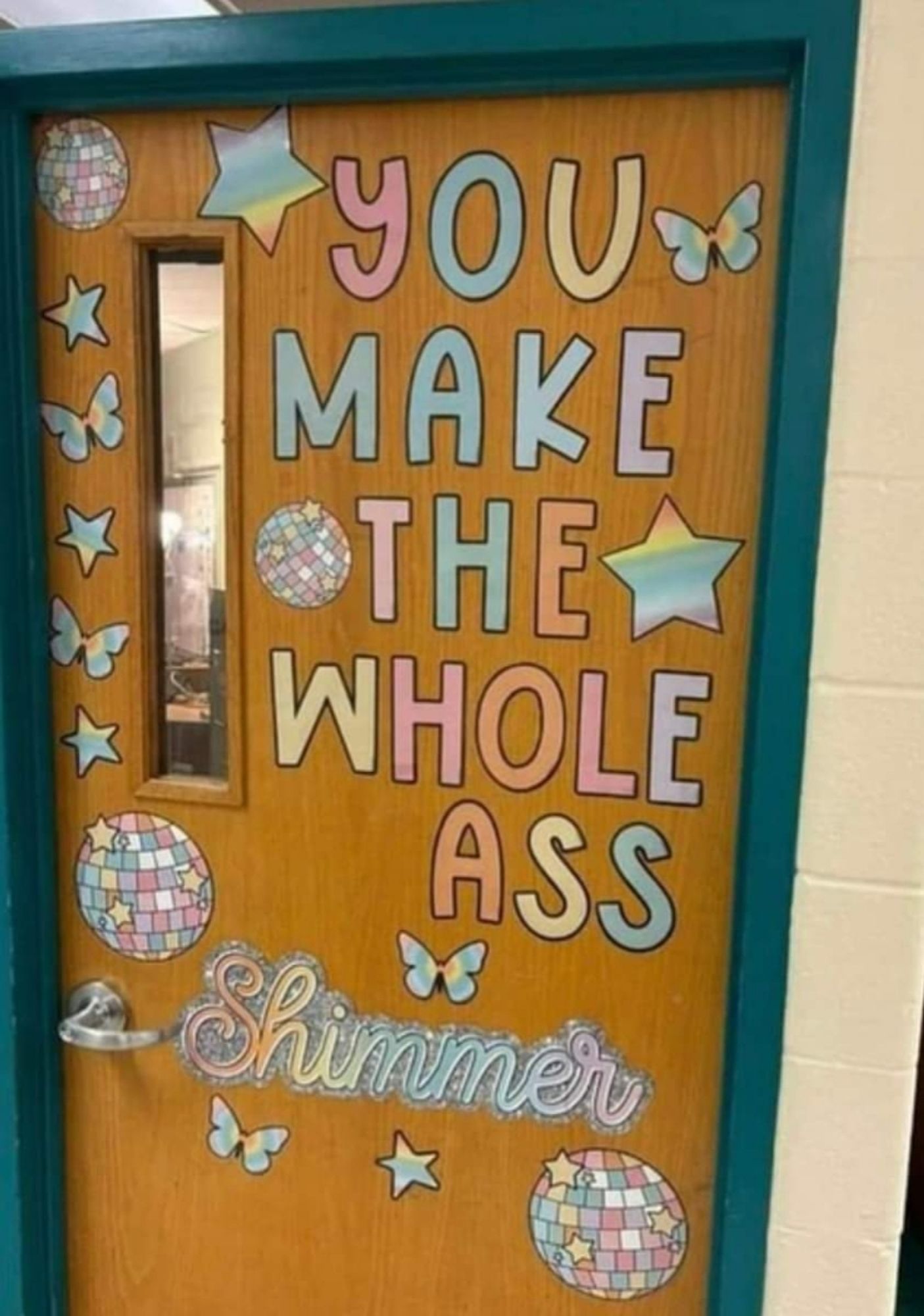 Classroom door stating, "You make the whole ass shimmer."