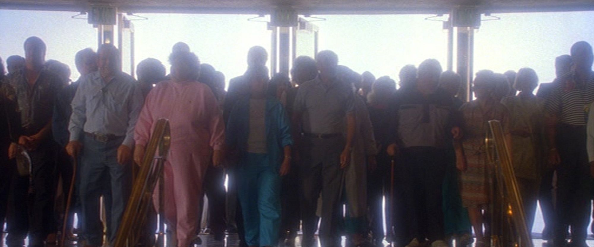 A shot of wall-to-wall open hotel doors, with an army of backlit elderly white folks in tourist clothes marching through, from the end of the film 'Casino'