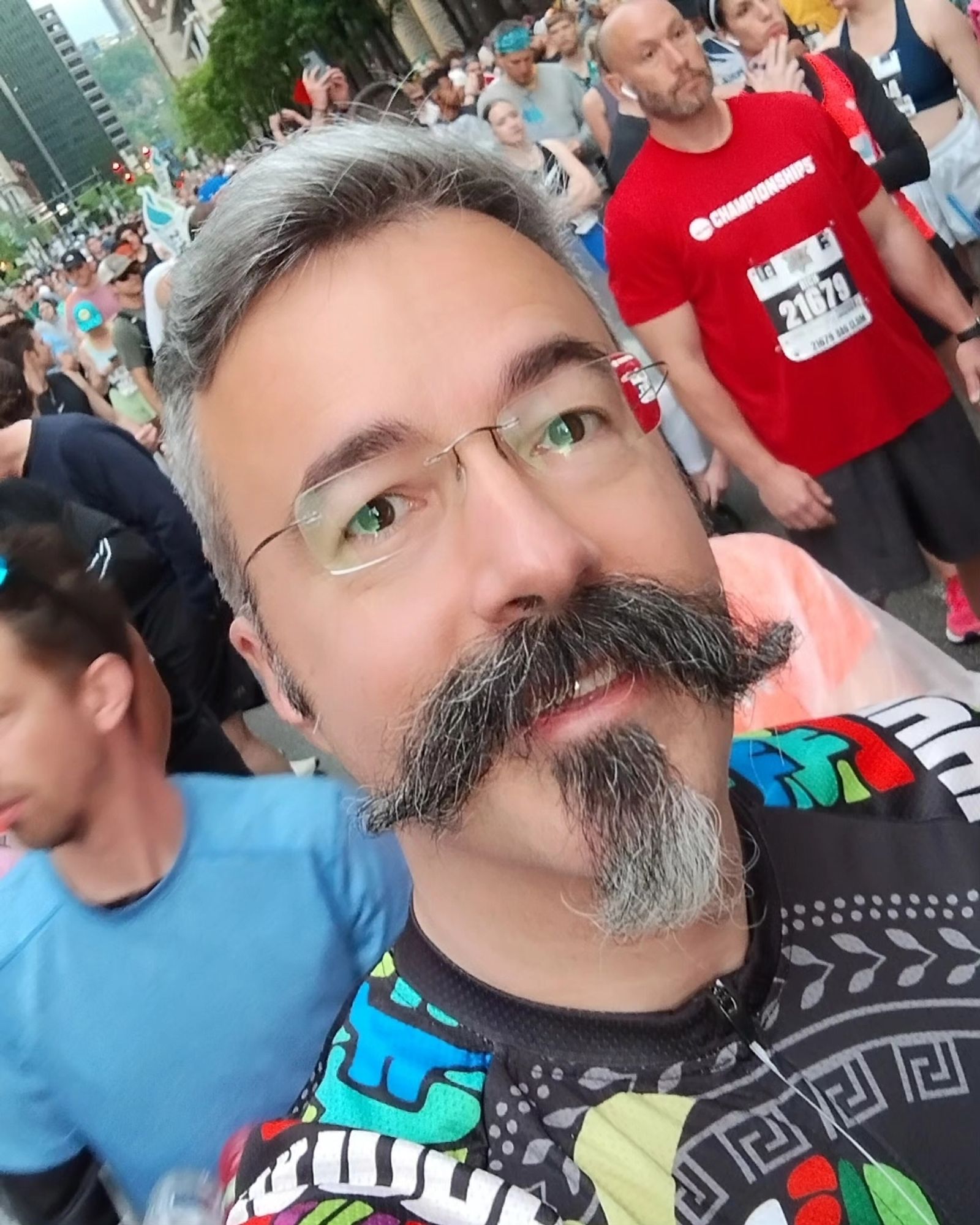 Tom smiles for a selfie in the crowd at the start of the Pittsburgh Marathon.