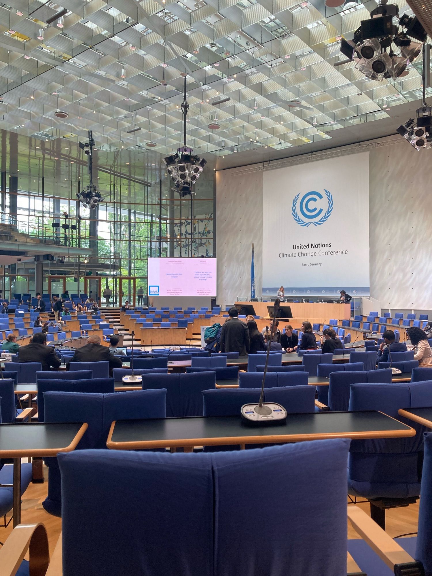 Plenary room with UNFCCC symbol in the centre