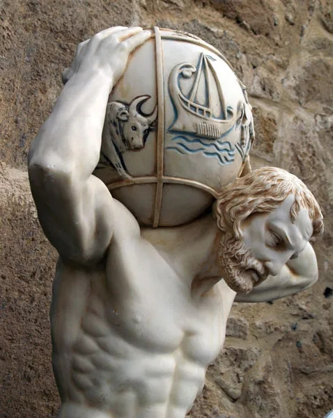 A statue of Atlas holding a globe