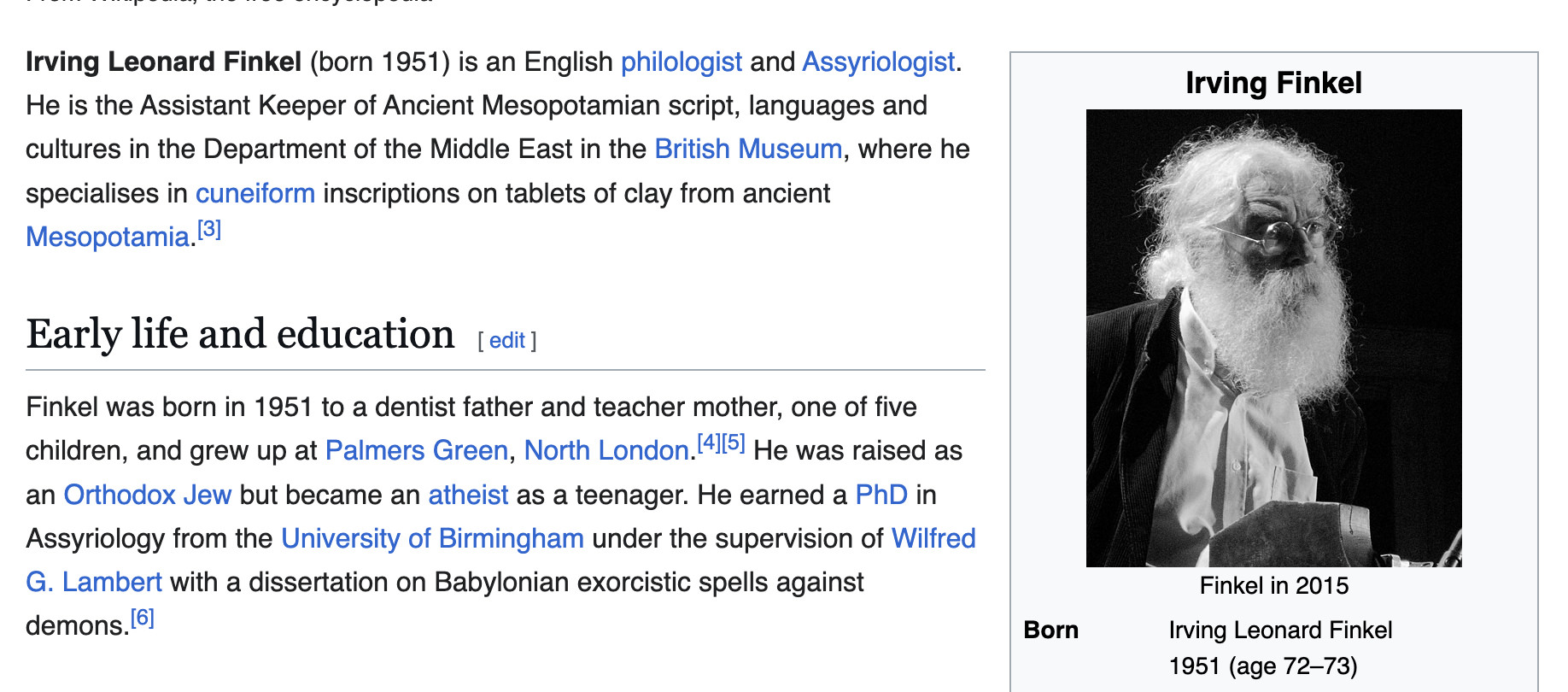 Crop of https://en.wikipedia.org/wiki/Irving_Finkel

N.B. this part: "[Finkel] earned a PhD in Assyriology from the University of Birmingham under the supervision of Wilfred G. Lambert with a dissertation on Babylonian exorcistic spells against demons."

Black-and-white portrait photo of Finkel included. Faces right, brow furrowed and beard frazzled with extreme intensity. He leans slightly forward. Photograph displays harsh contrast between the blacks of the background and his coat versus the whites of his beard and suit.