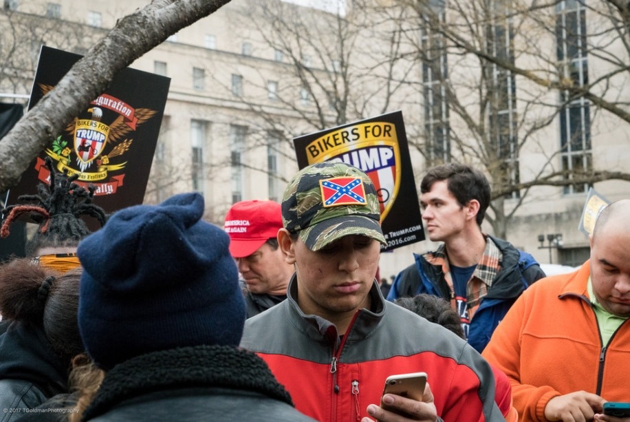 Cesar Subervi in a group holding signs that say "BIKERS FOR TRUMP"