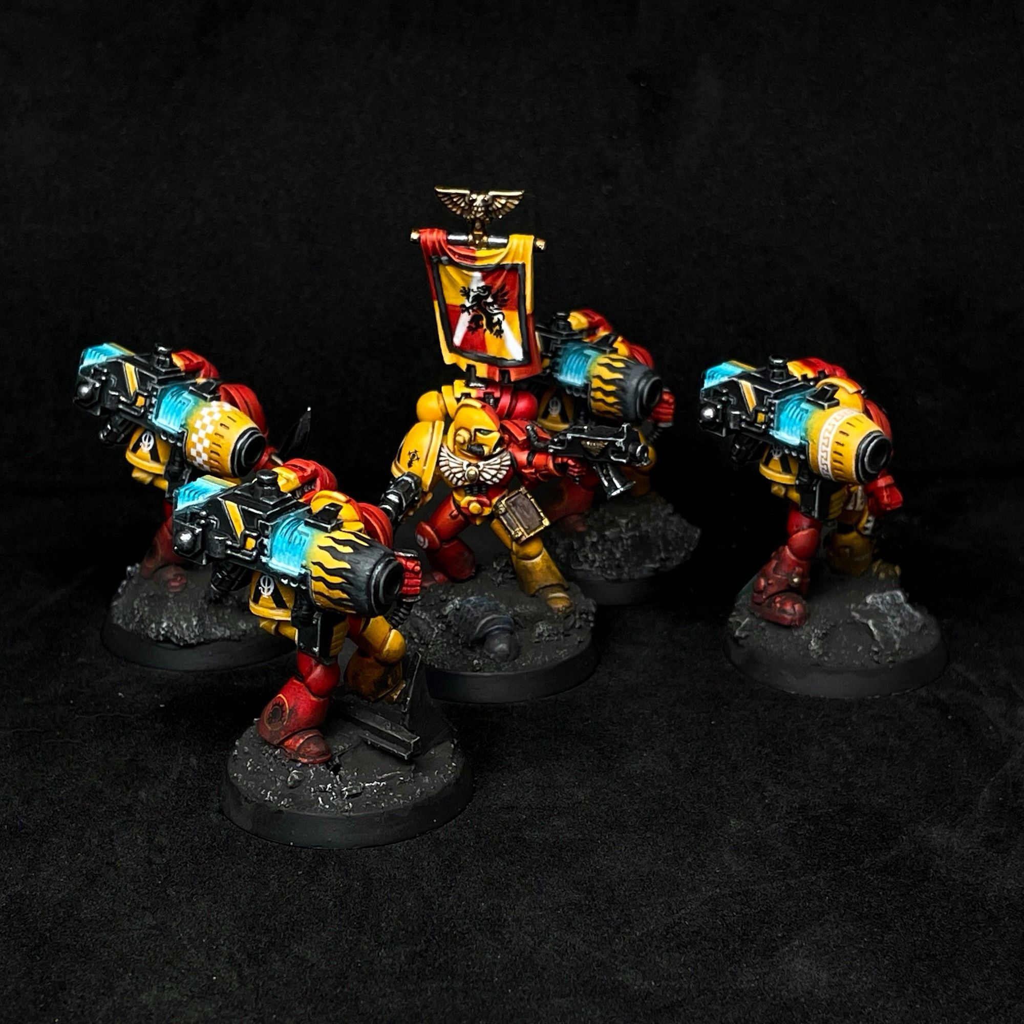 Oldschool space marine devastator squad with plasma cannons.