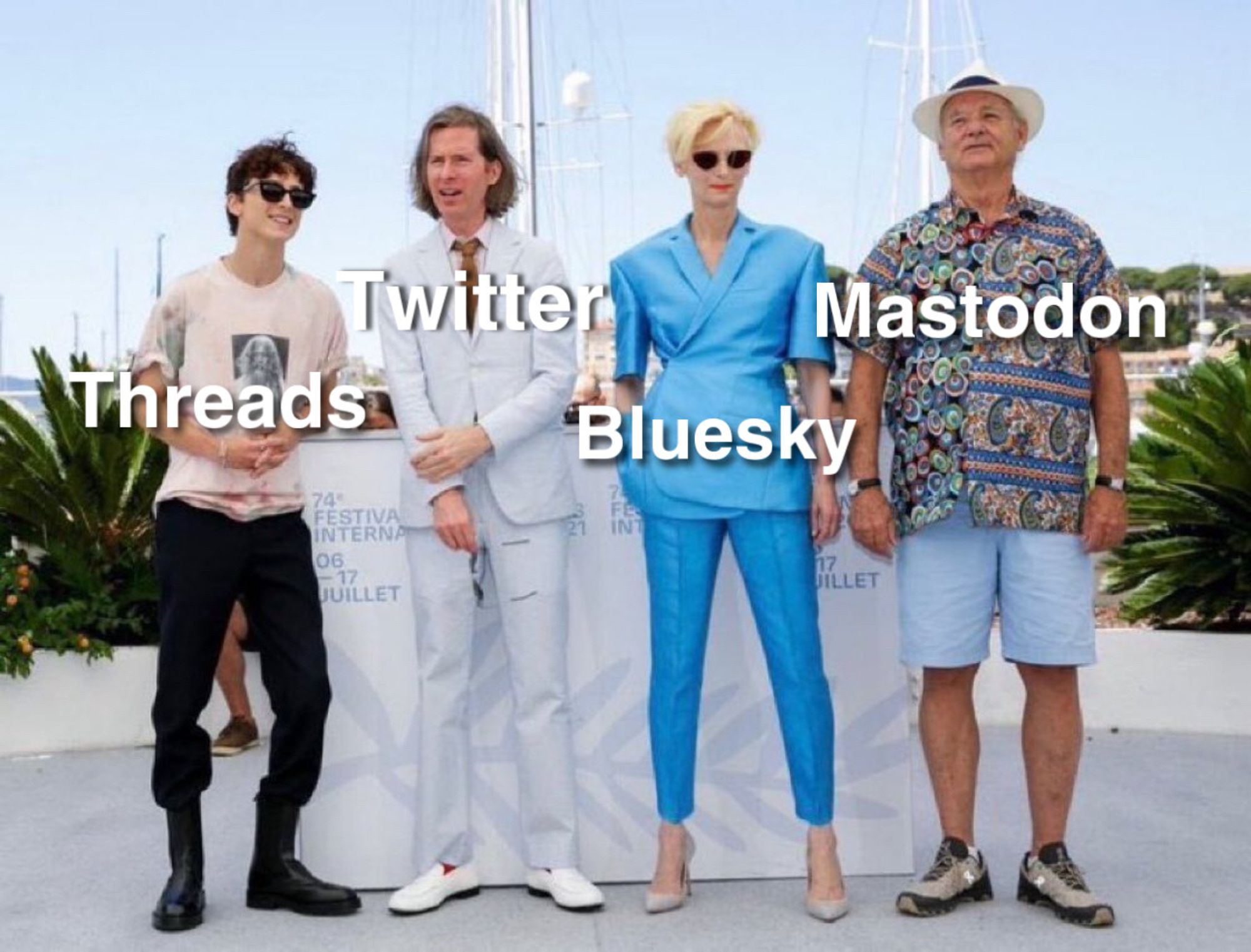 pic of 4 people dressed differently for an event. twitter is a male in a classic suit, bluesky is a woman in a chic suit, threads is a kid who looks dressed for high school and mastodon looks dressed to go wash the car.