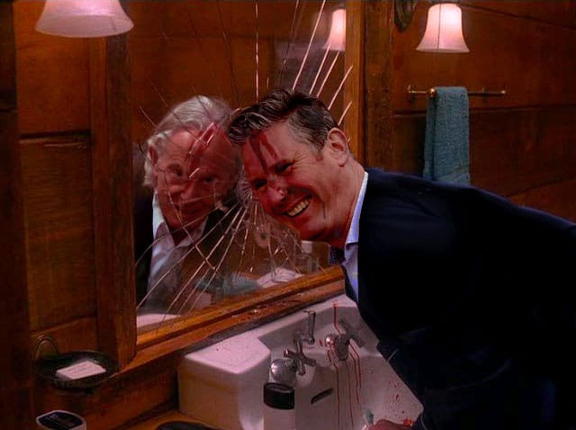 agent cooper's doppleganger covered in blood and grinning whilst looking in the mirror at the end of twin peaks but it's starmer and blair *centrist Angelo Badalamenti music plays*