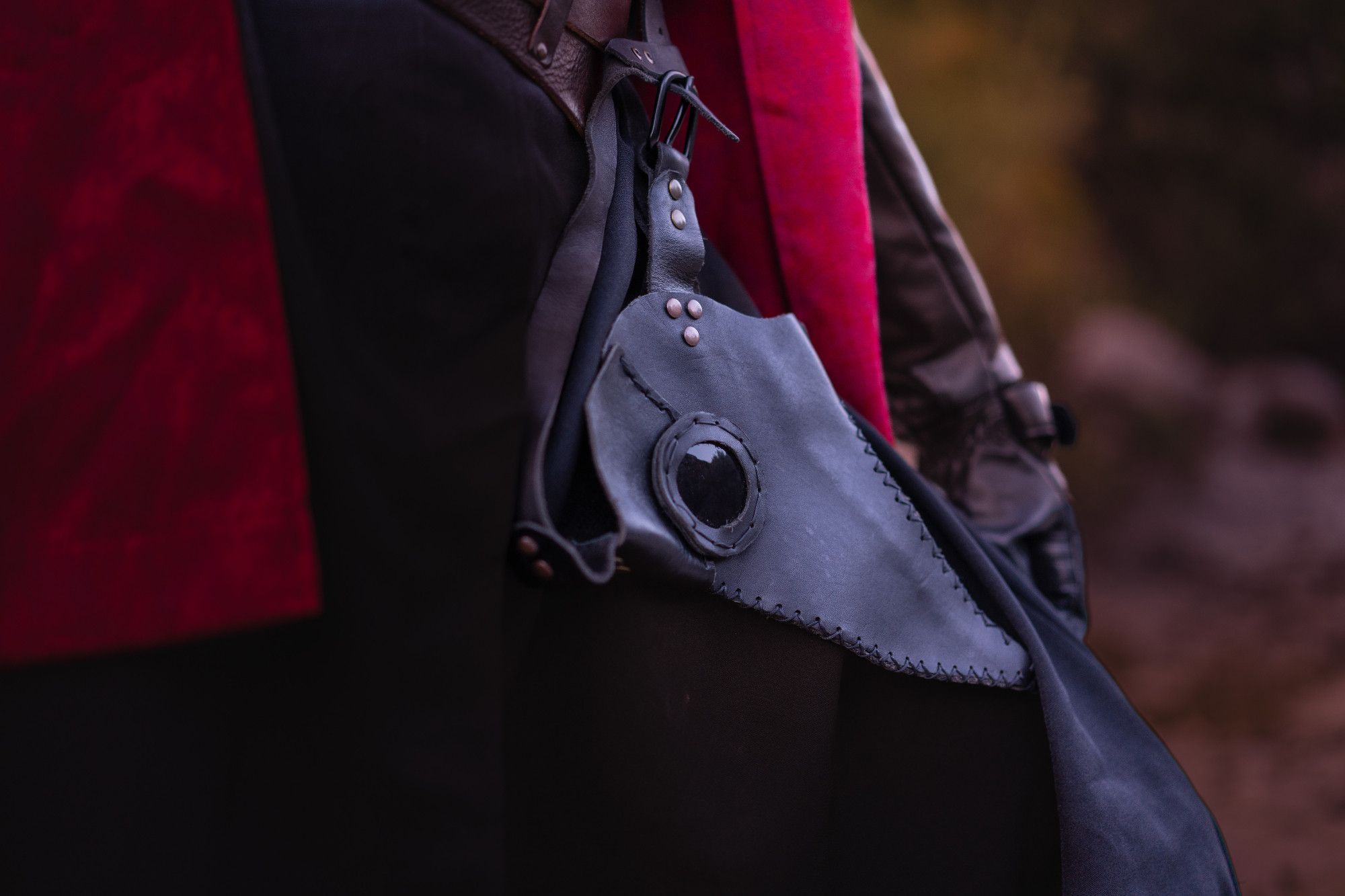 Photo of a plague doctor mask attached to a belt