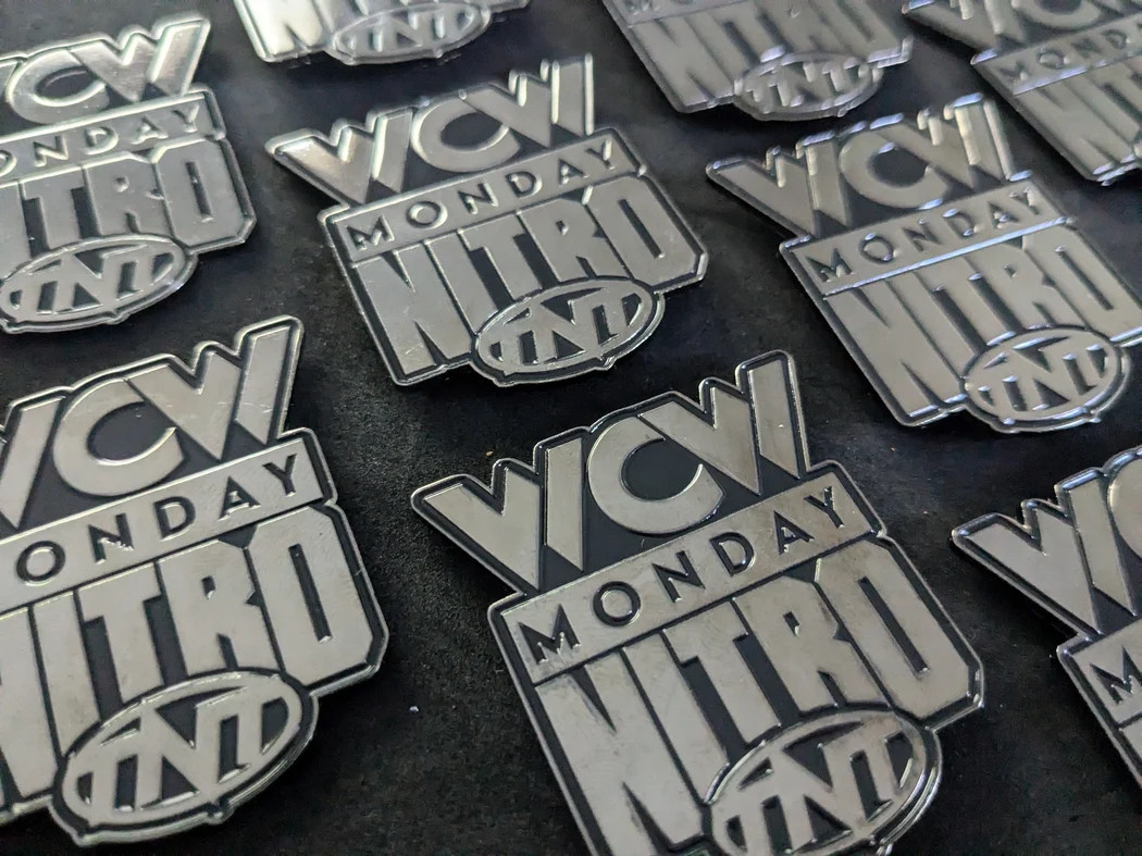 Enamel pin of the WCW MONDAY NITRO on TNT logo from 1995-1999.