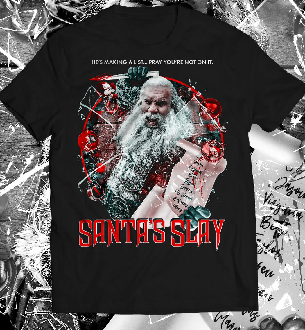 Santa’s Slay shirt designed by @errorbadunit. Photo of Bill Goldberg dressed as evil Santa from the film with the tagline HE’S MAKING A LIST … PRAY YOU’RE NOT ON IT.