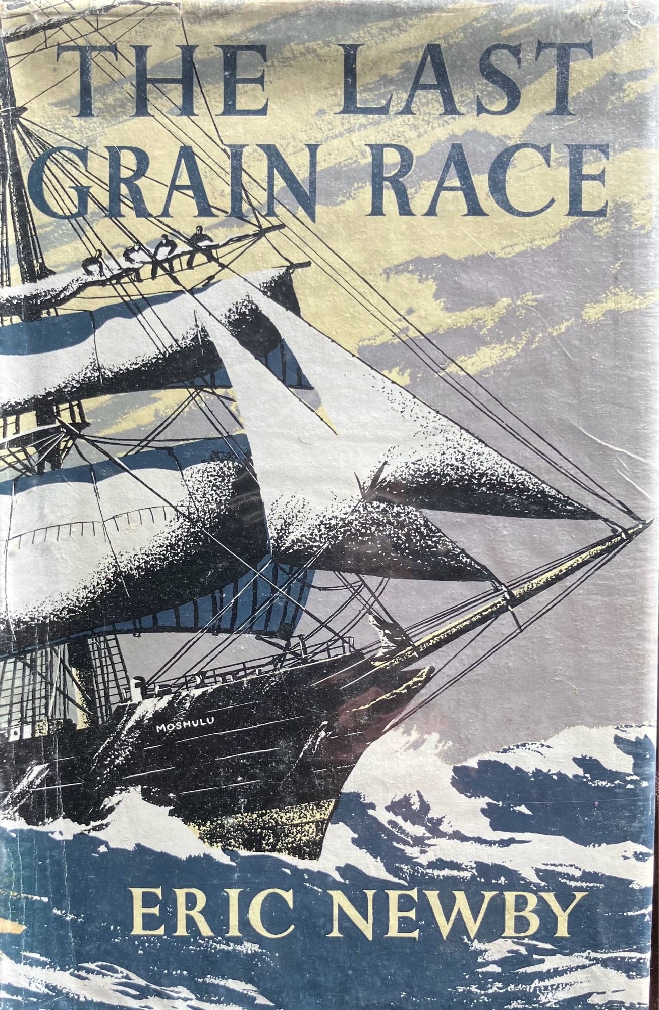 Cover of Eric Newby’s first travel book, The Last Grain Race. The cover has a brilliant illustration of a shop under full sail charging through a cold, rough sea - while four sailors attempt to take in a sail high up on the rigging.