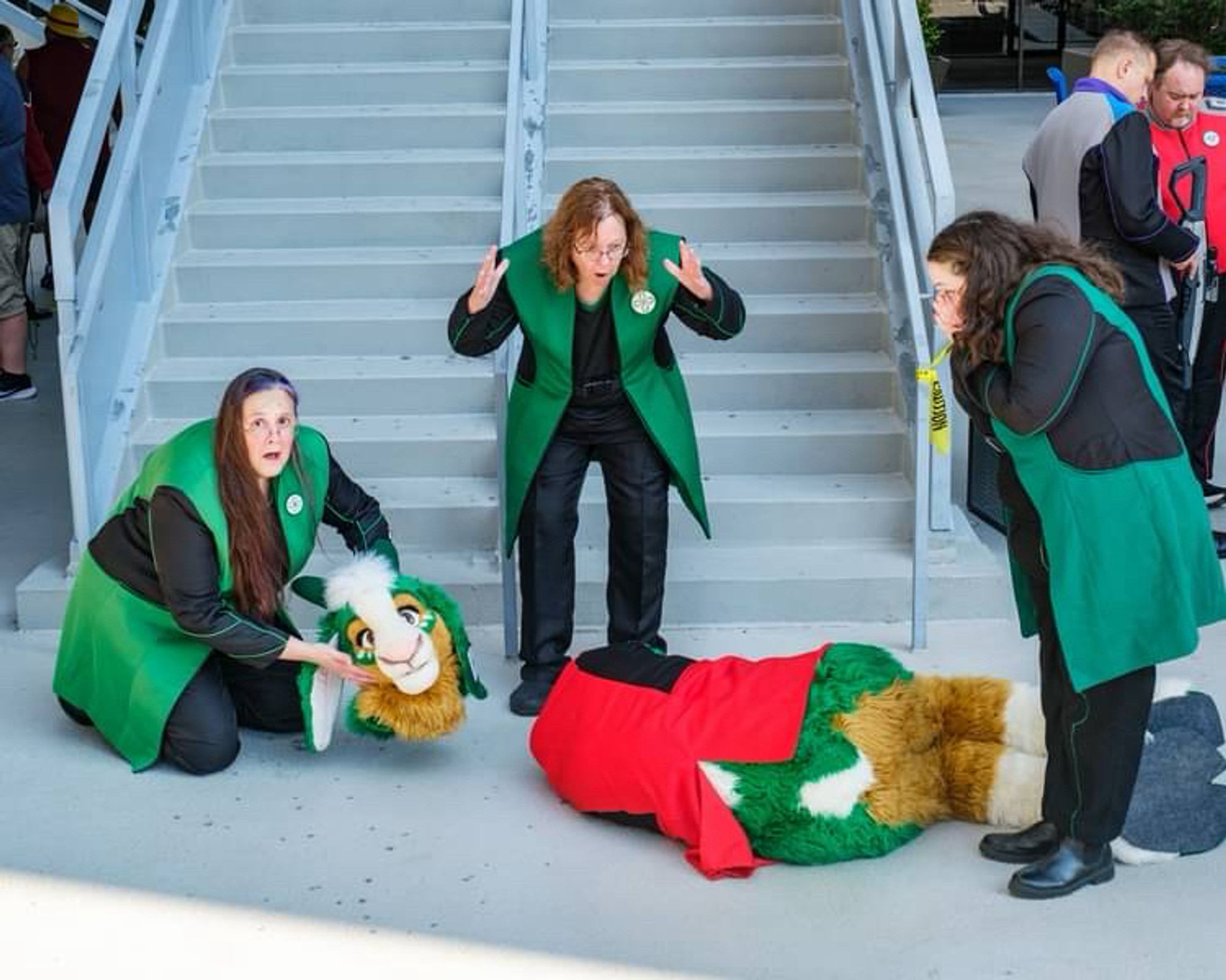 Trio of Orville medical officers with a headless furry. One officer holds the furry’s head with horror.