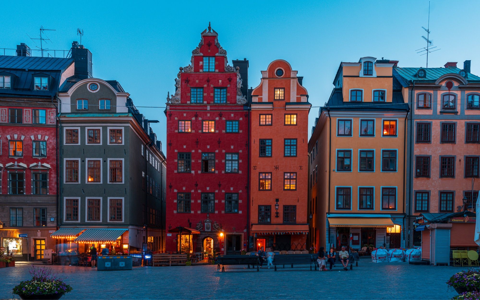 Evening blue hour at Stortget, the oldest square in Stockholm with lights switched on from windows of the buildings.