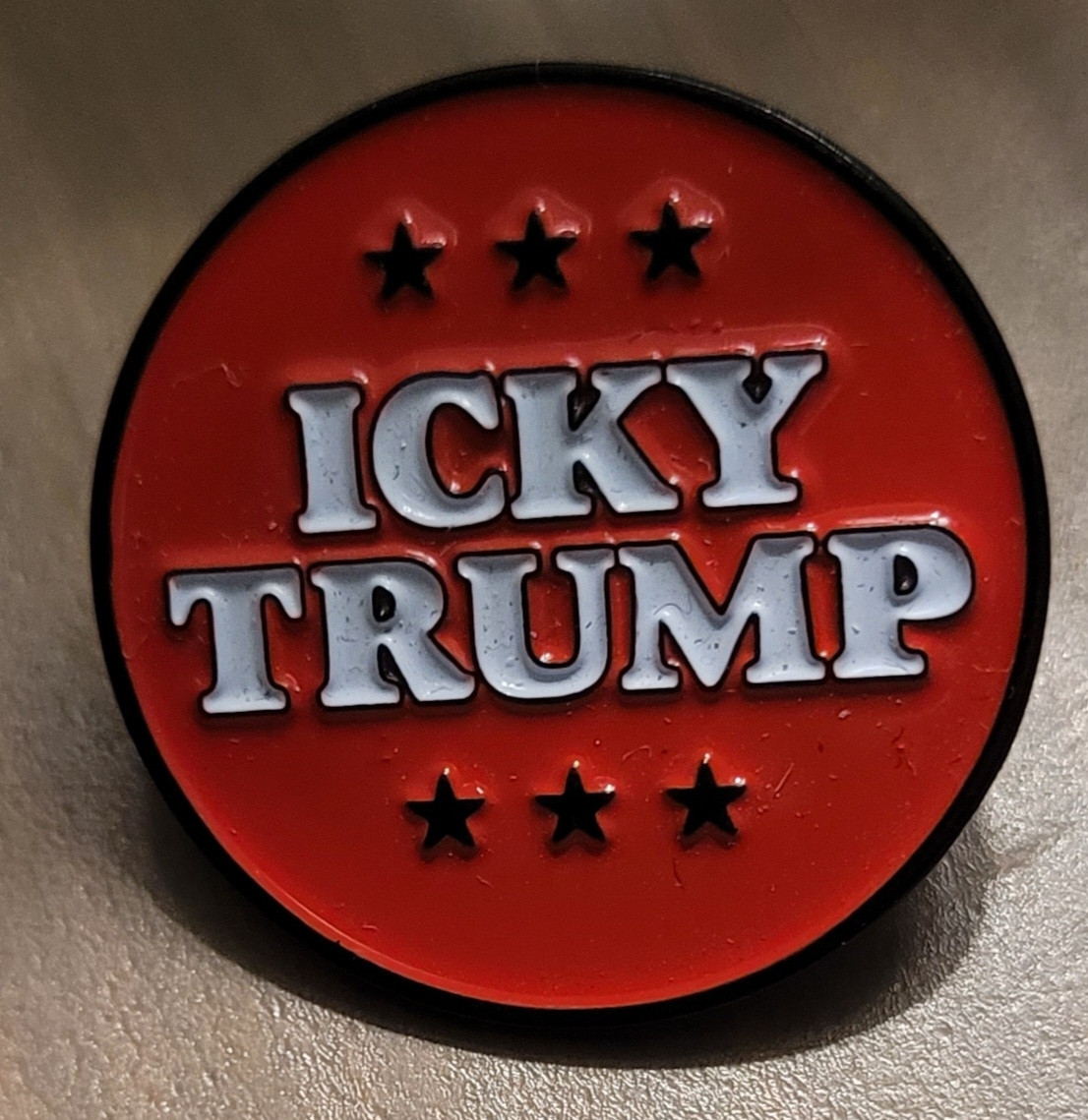 Button that says Icky Trump