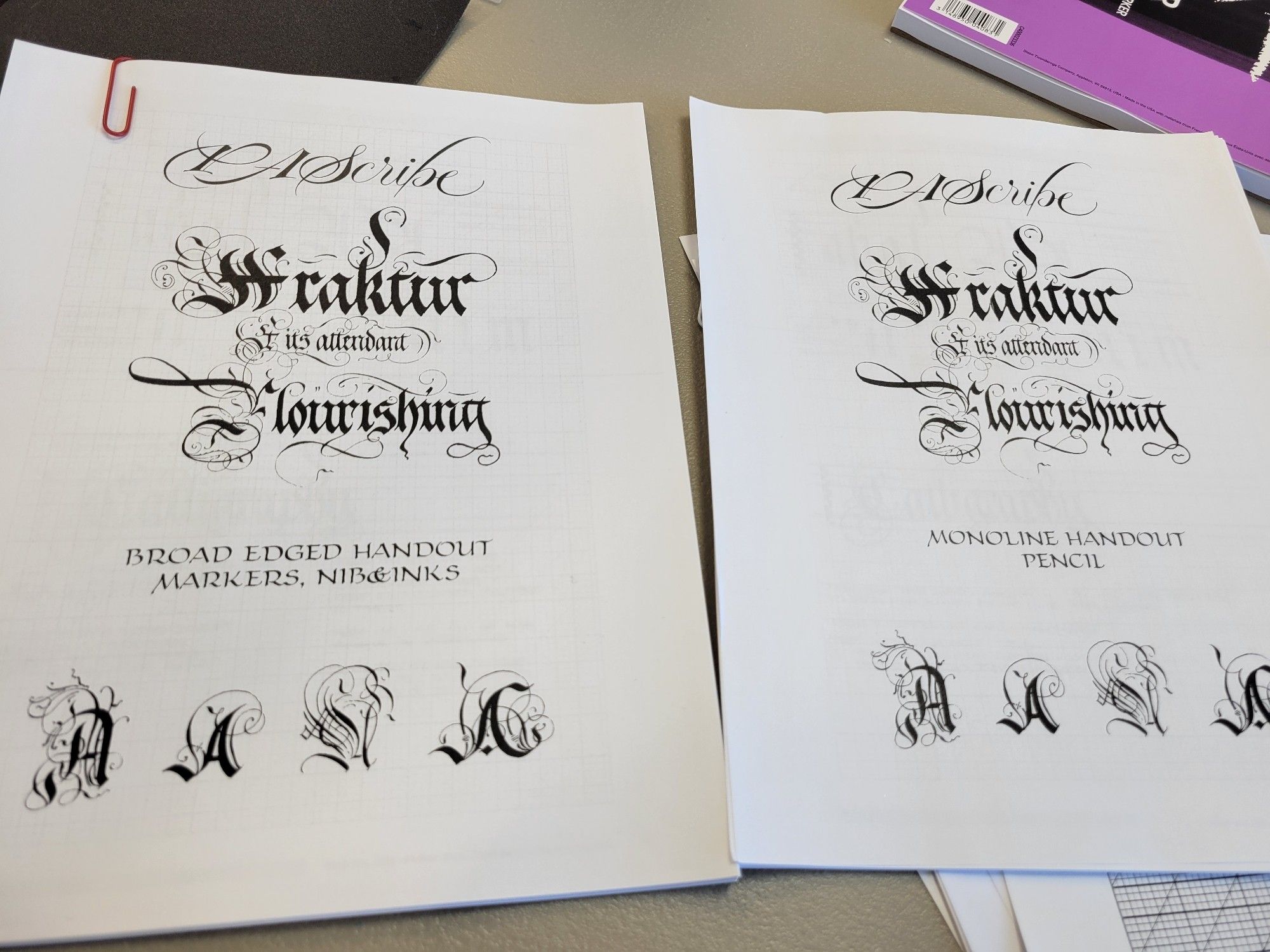 An image of two packets of paper titled 'PASCRIBE, Fraktur and its Attendant Flourishing'. One packet says it's for 'Monoline Handout Pencil', the other is 'Broad Edged Handout. Markers, Nibs and Inks.'