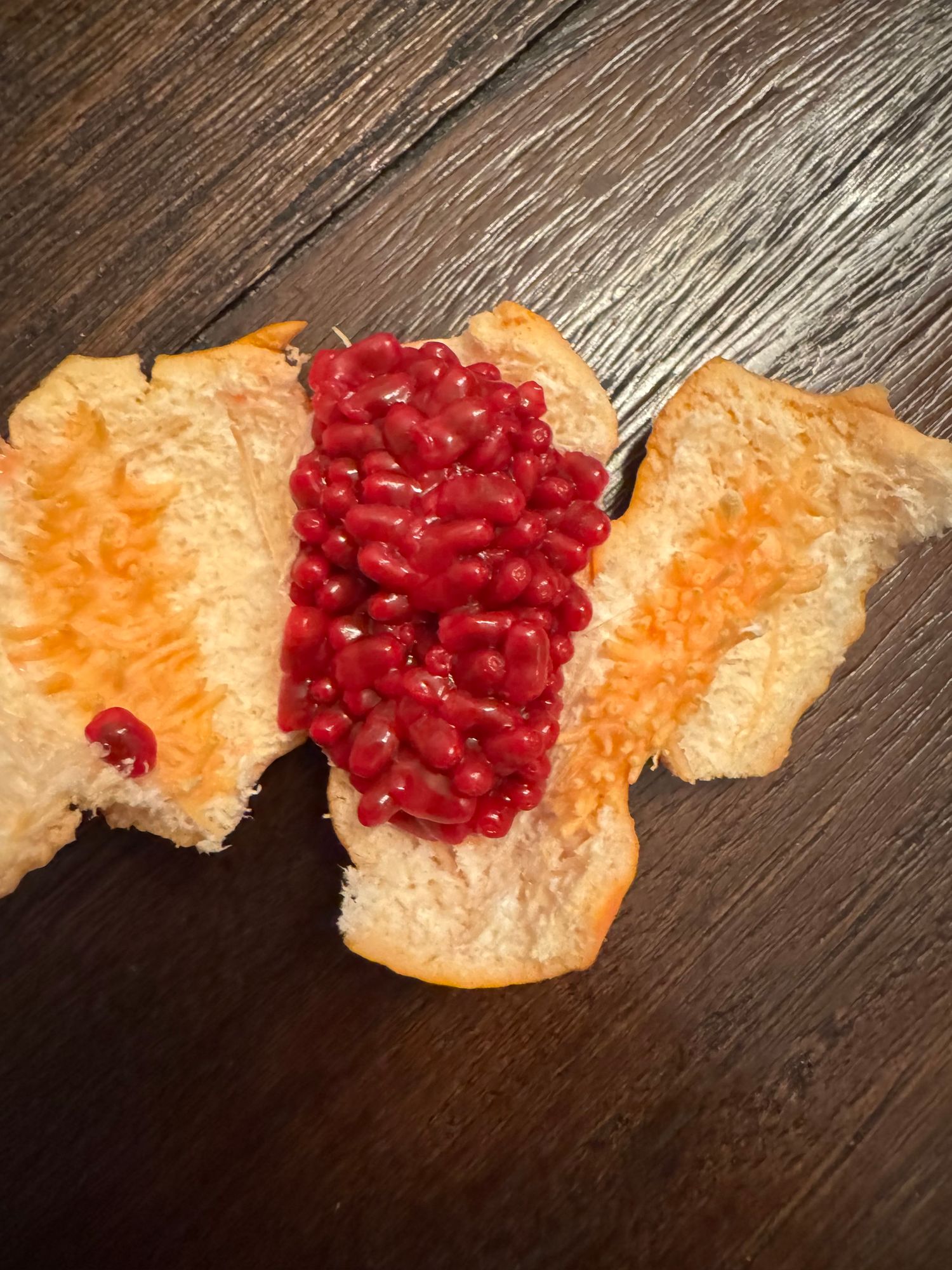 Inside fruit, red crunchy bits