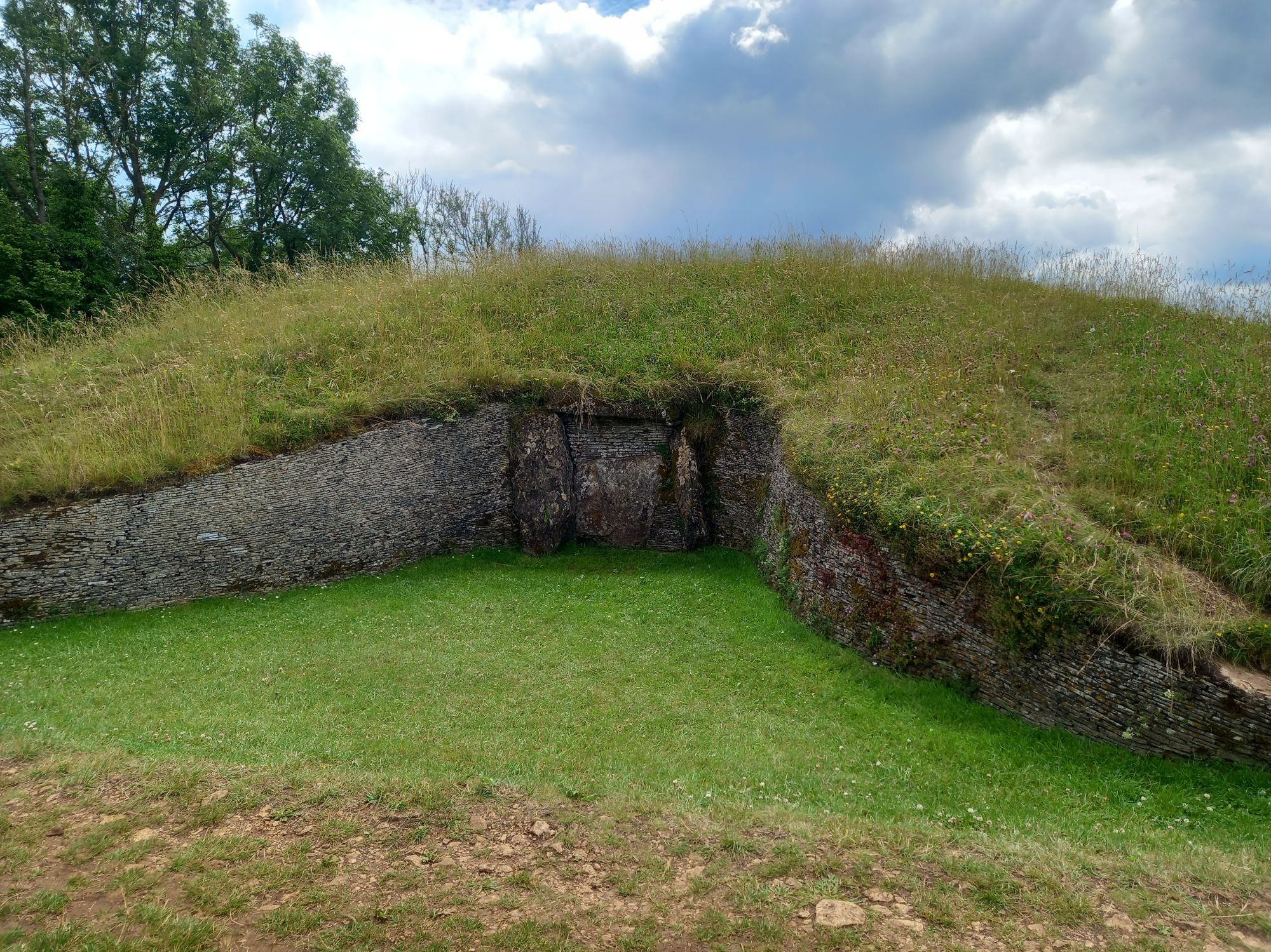 A wider view of the entrance to Belas Knap long barrow