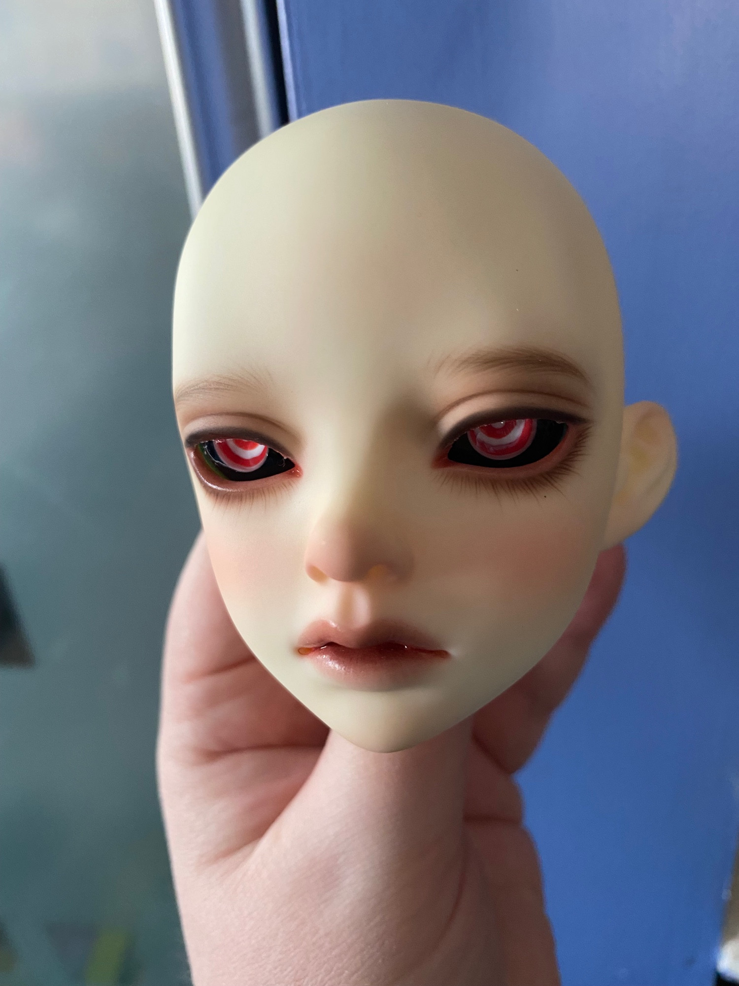 A BJD (head) version of Calamarity. Her sculpt is a K-Doll Keikei, and her eyes were custom made by demonforestcreations.