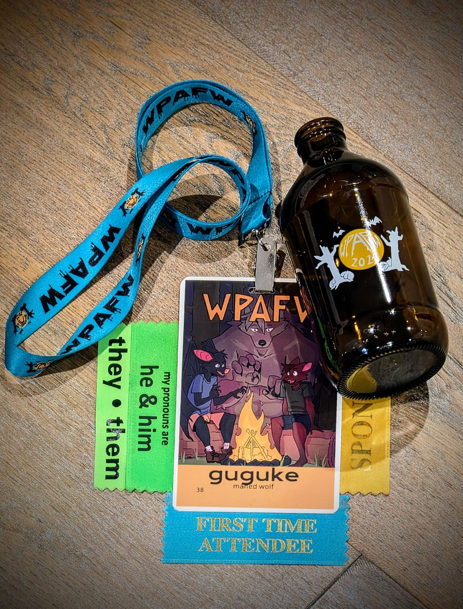 WPAFW con badge, lanyard, and glass bottle (sponsor gift)