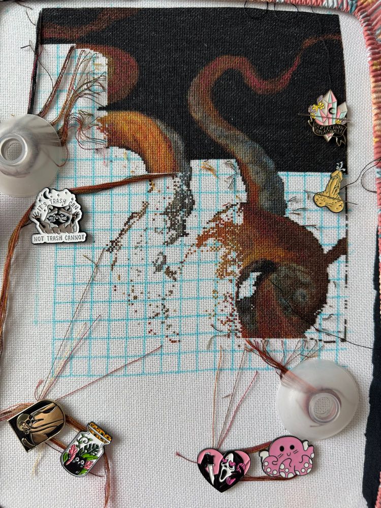 A close up photo of my cross stitch project. Tentacles are becoming clearer