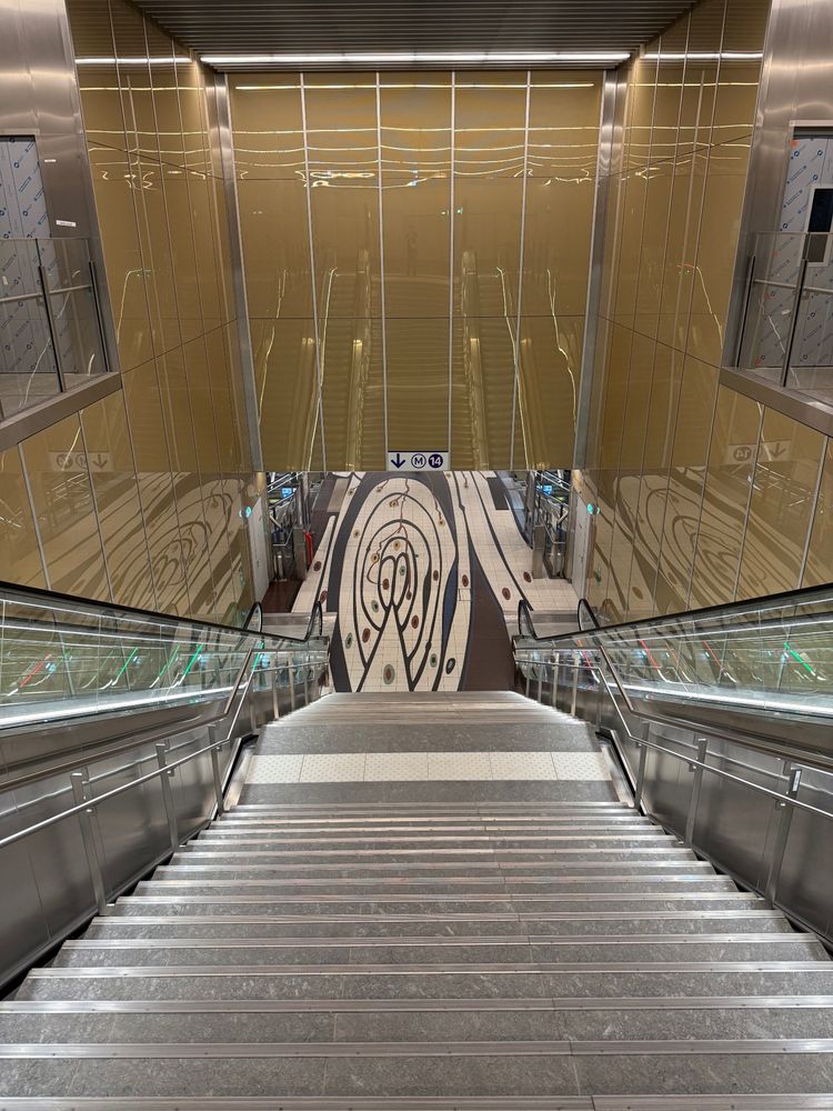 Patterned floor as public art, yellow/brown walls