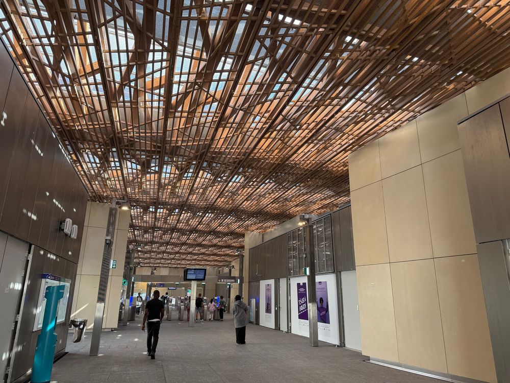 Concourse of Hôpital Bicêtre station with wooden ceiling 