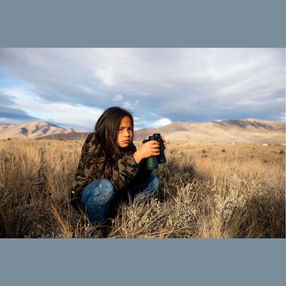Child with binoculars