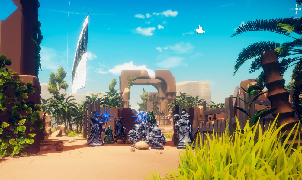 A screenshot from a game in early development with some game pieces standing in a desert ruins scene, with some playing cards floating in the sky.