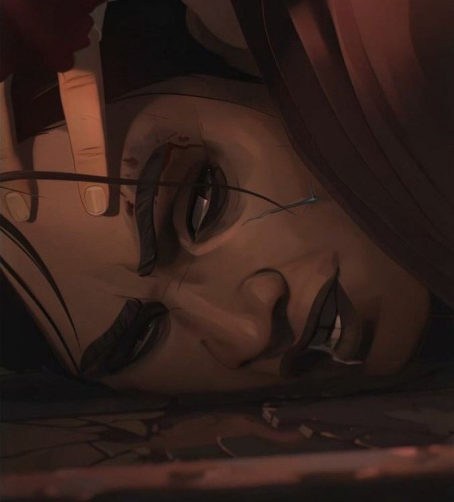 Sevika from arcane- her face is pressed against a broken table. She is looking over her shoulder and towards the person that is pushing her face into the table who is out of frame in this picture